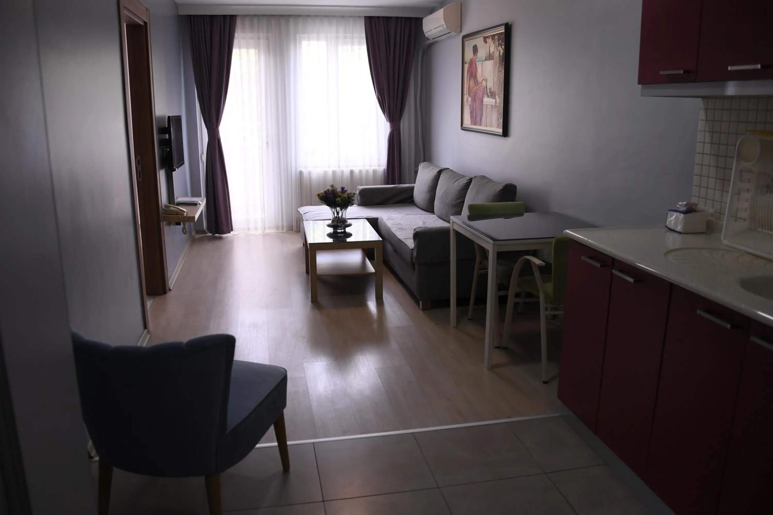 Seating area in A Hotels & Suite