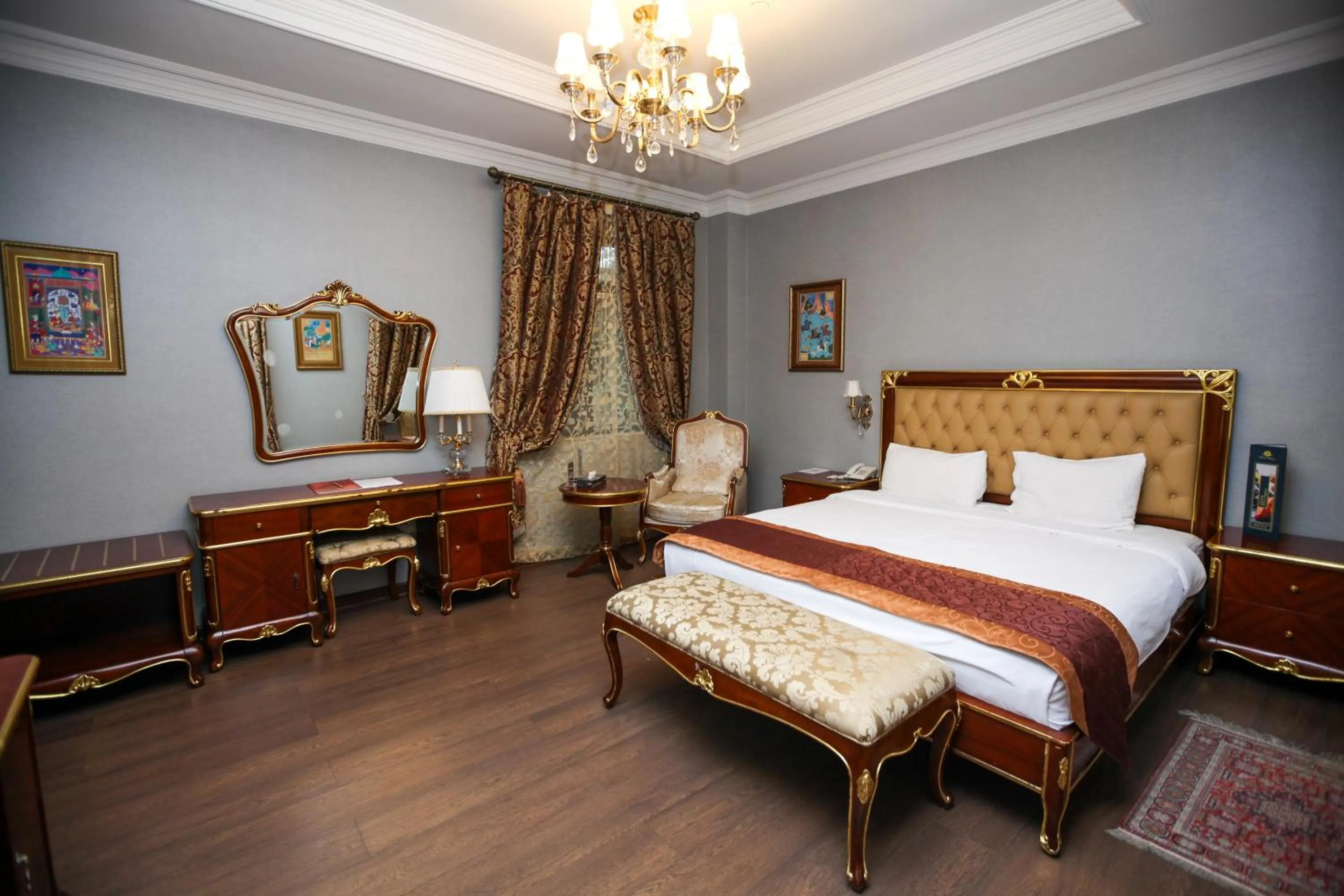 Bed in Shah Palace Luxury Museum Hotel