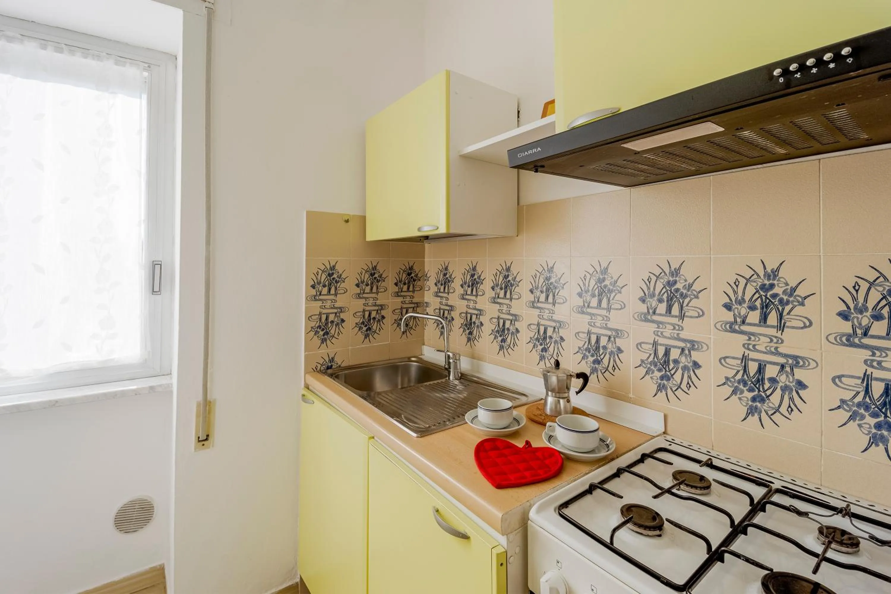 Kitchen or kitchenette in Loano Apartment Pool & Garden