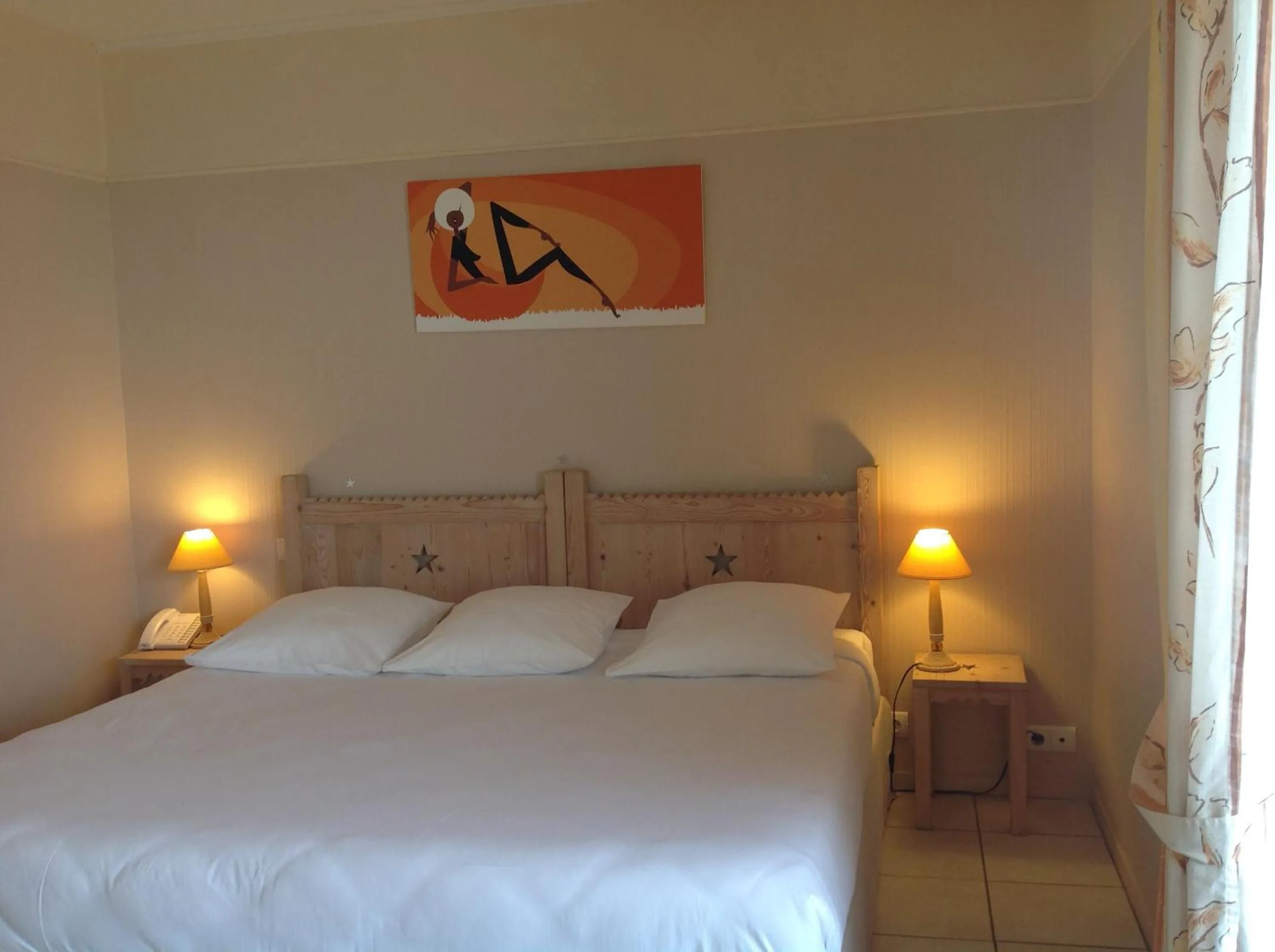 Bed in L'Oasis