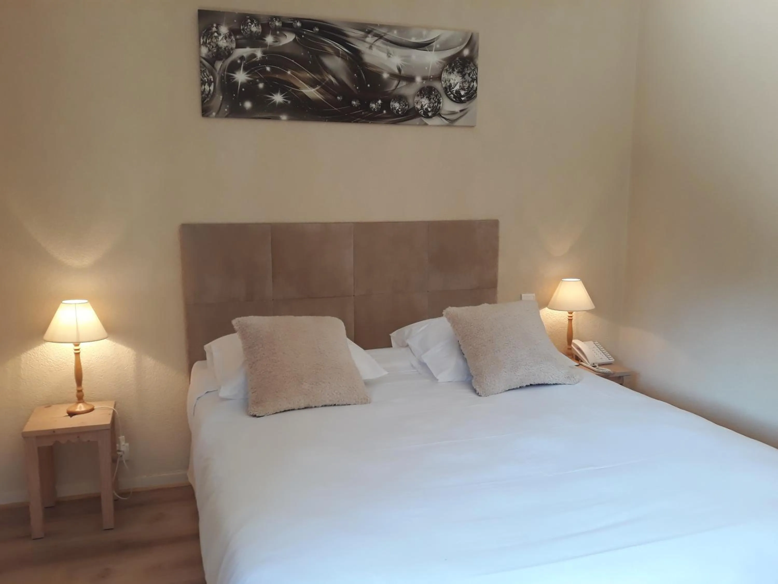 Bed in L'Oasis