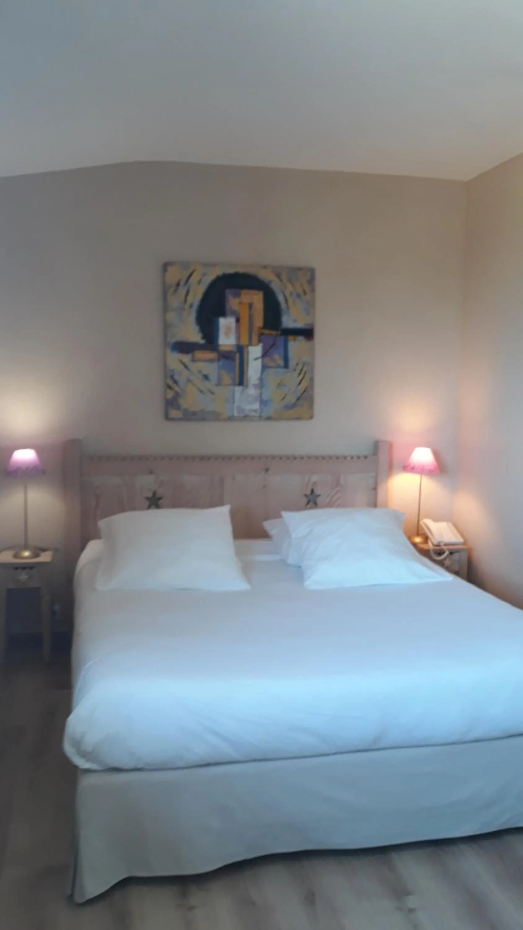 Bed in L'Oasis