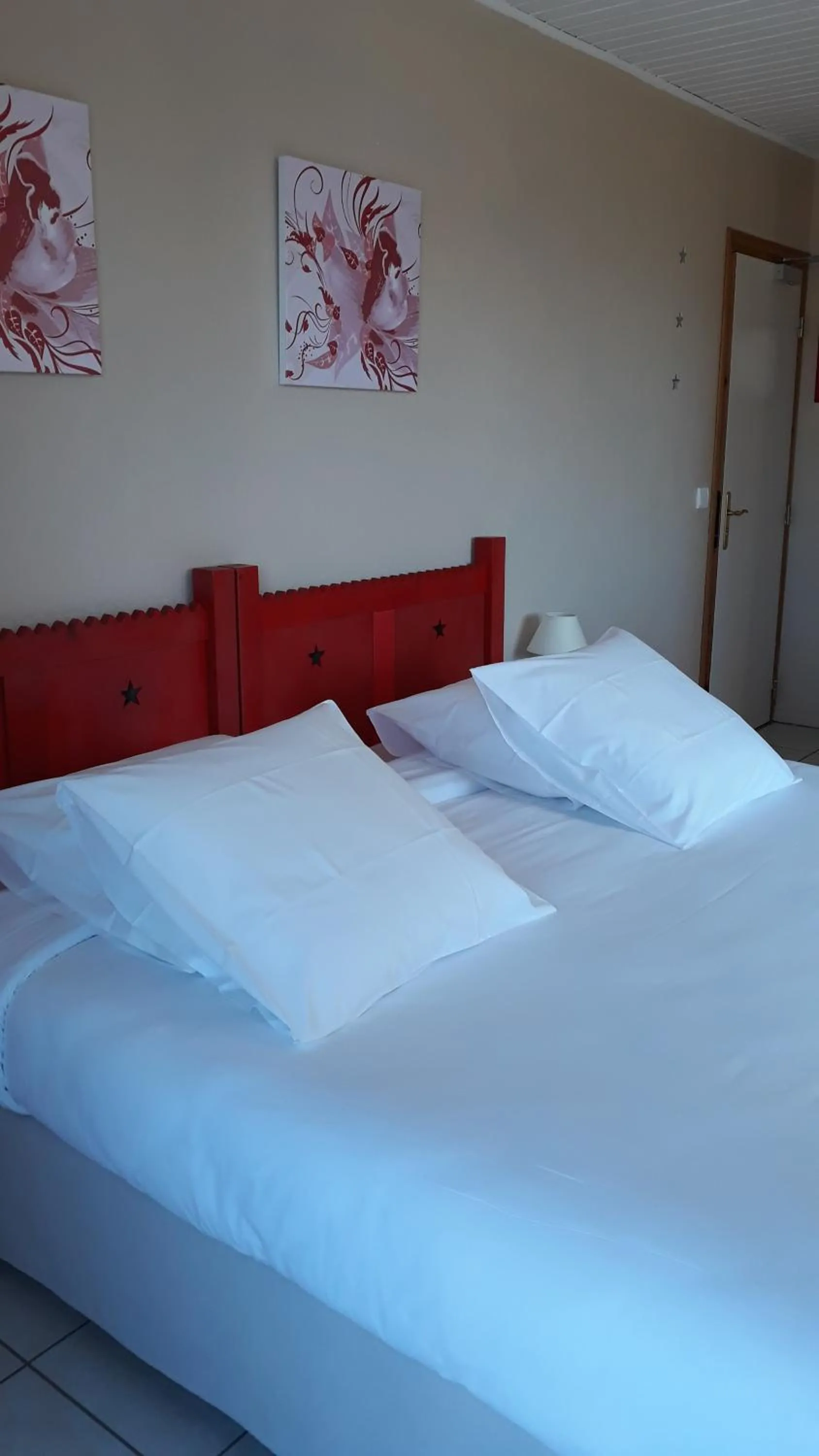 Bed in L'Oasis
