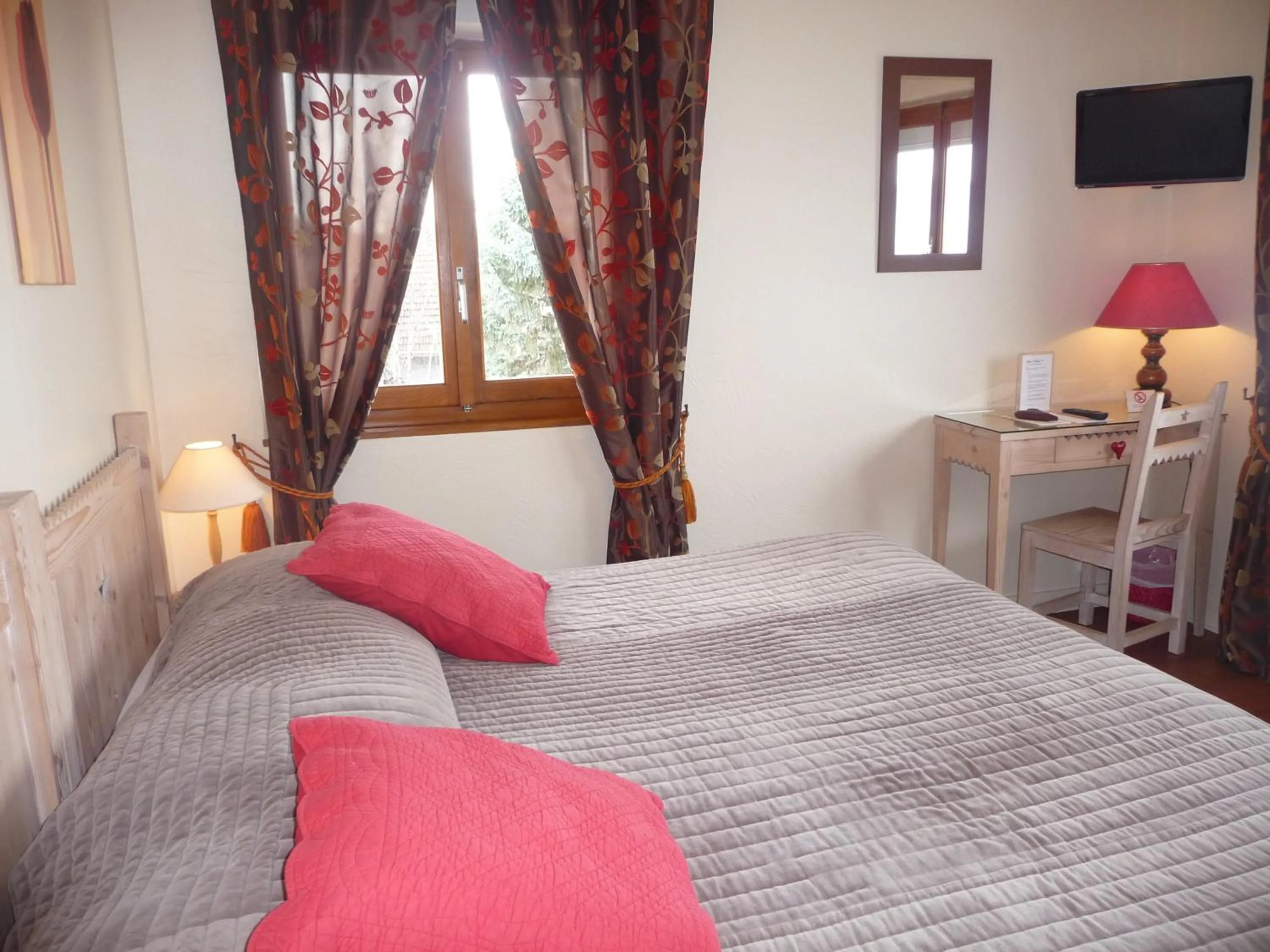 Bed in L'Oasis