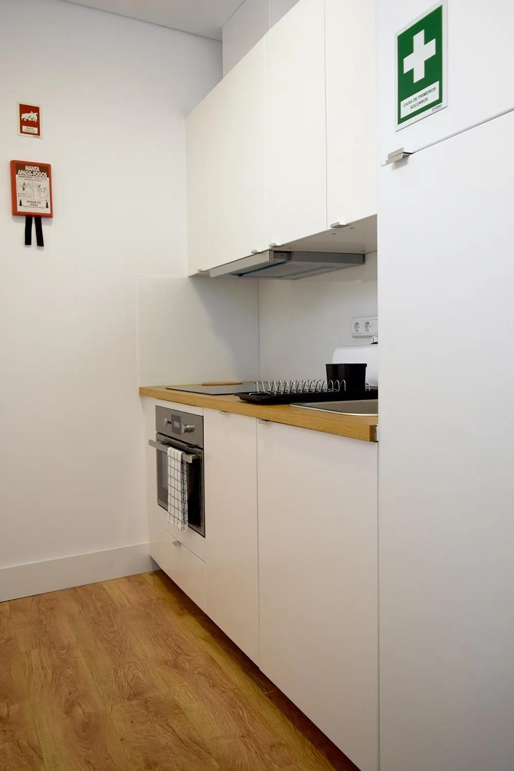 Kitchen or kitchenette in Villa Graça -Hostels and Apartments