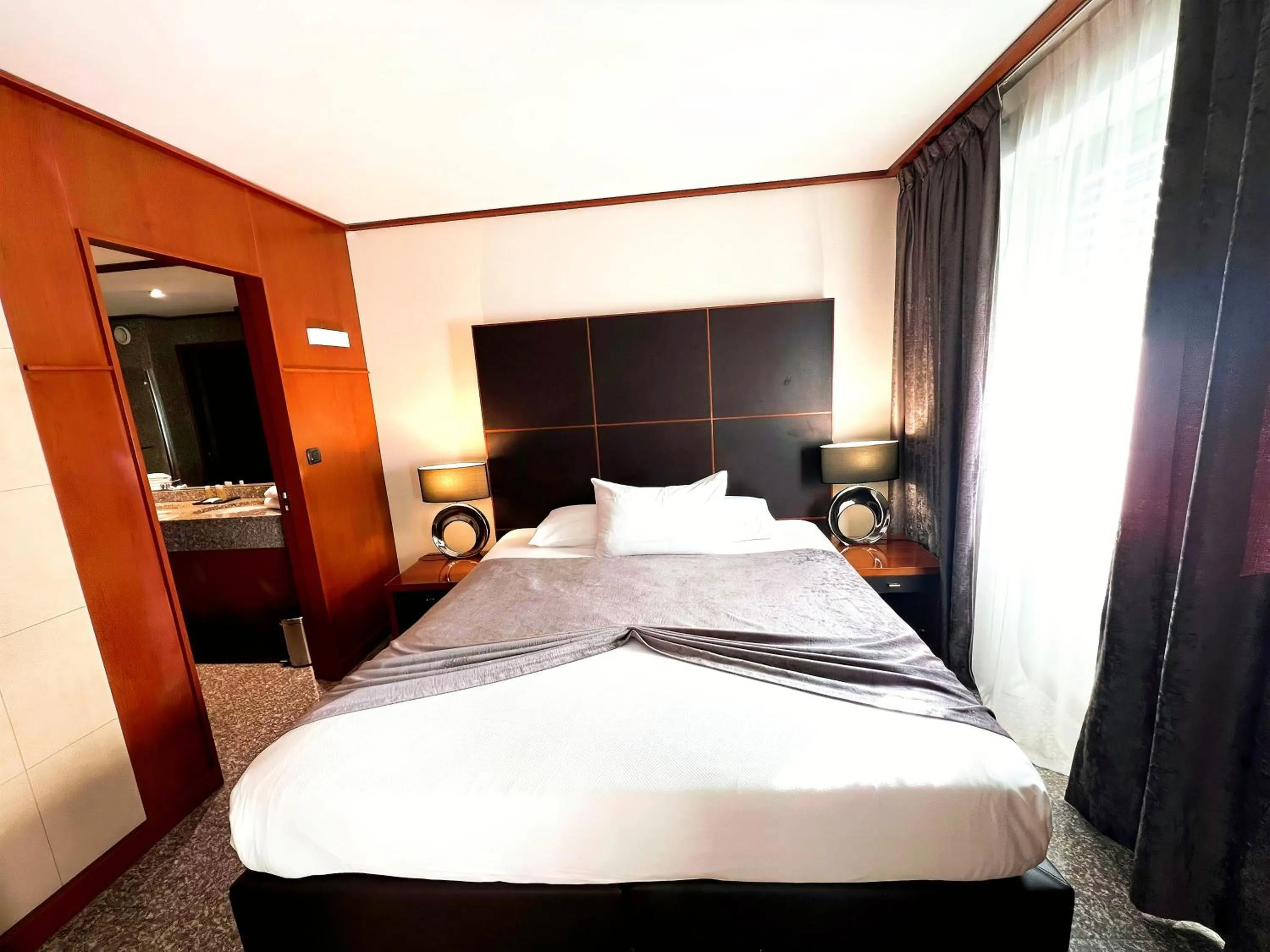 Photo of the whole room, Bed in Goldstar Apartments & Suites