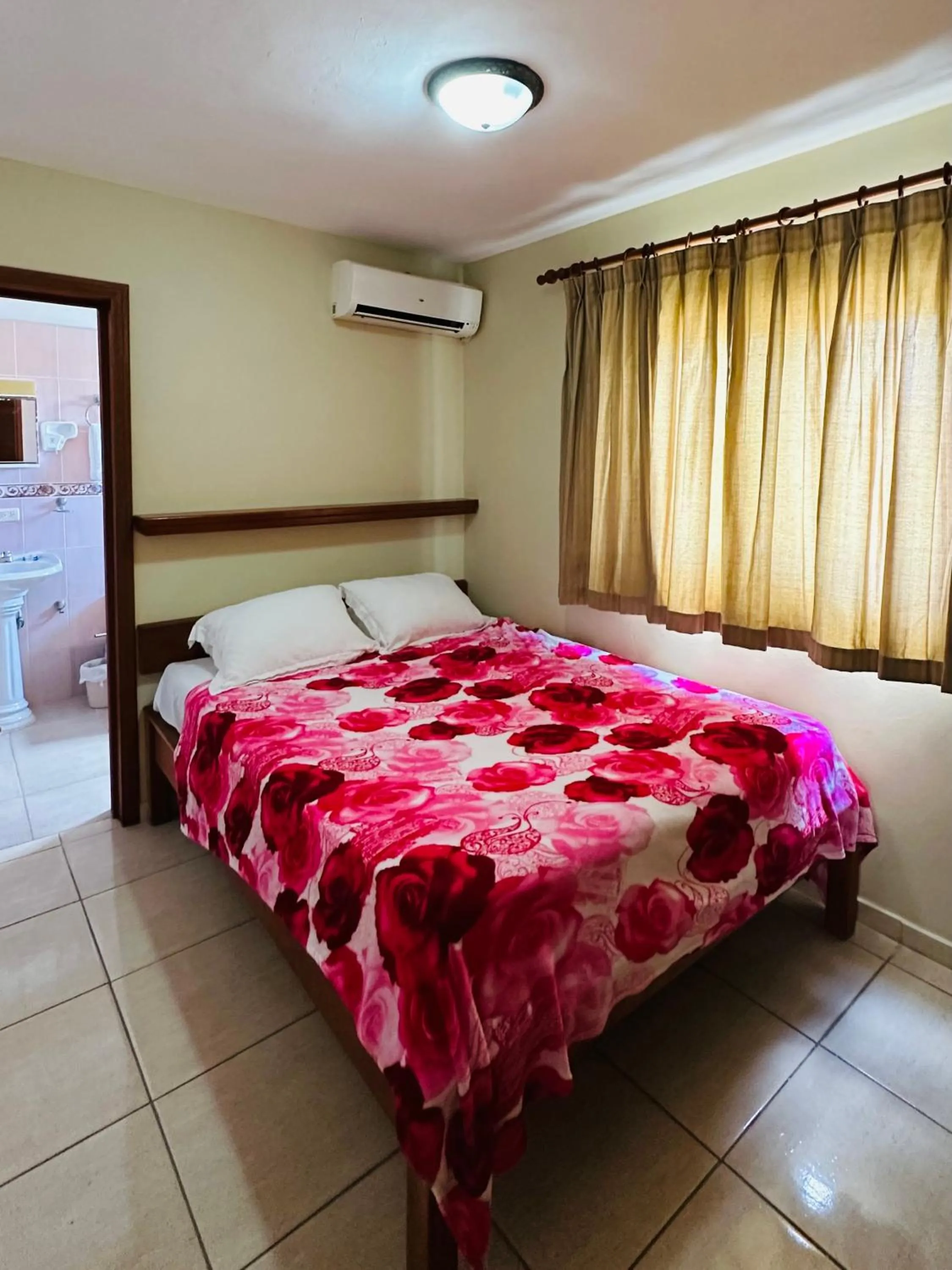 Bed in Aparthotel Michaela