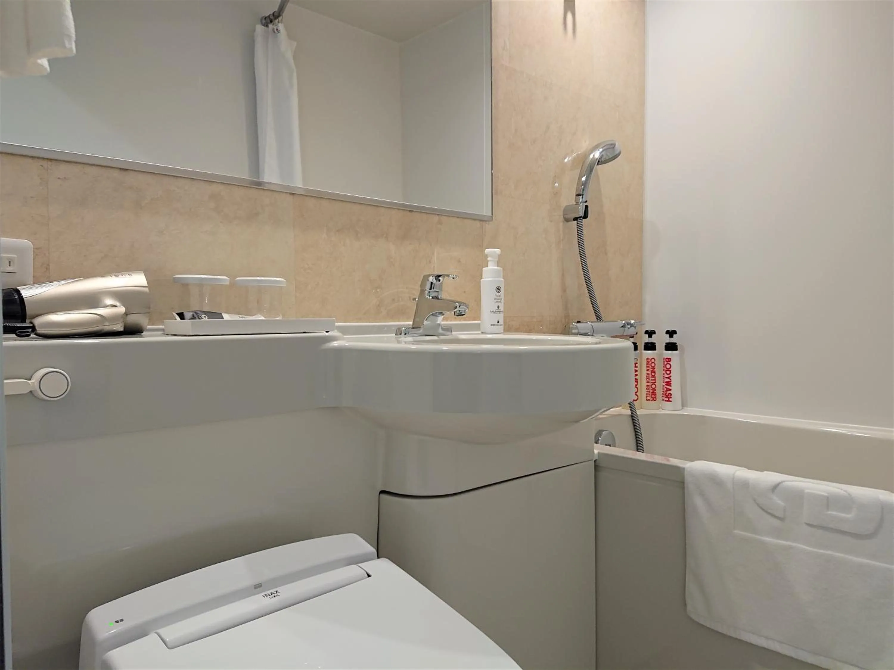 Bathroom in Green Rich Hotel Okinawa Nago (Artificial hot spring Futamata Yunohana)