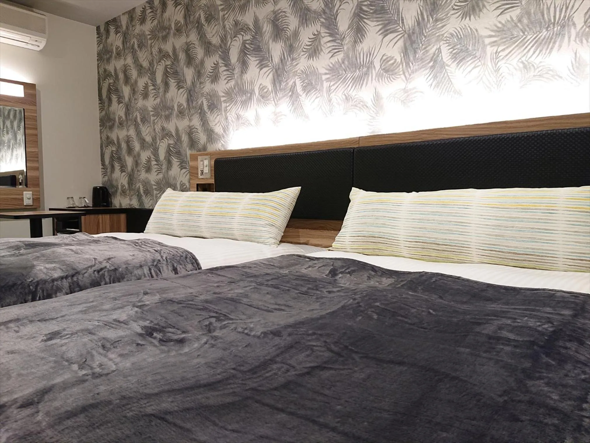 Photo of the whole room, Bed in Green Rich Hotel Okinawa Nago (Artificial hot spring Futamata Yunohana)