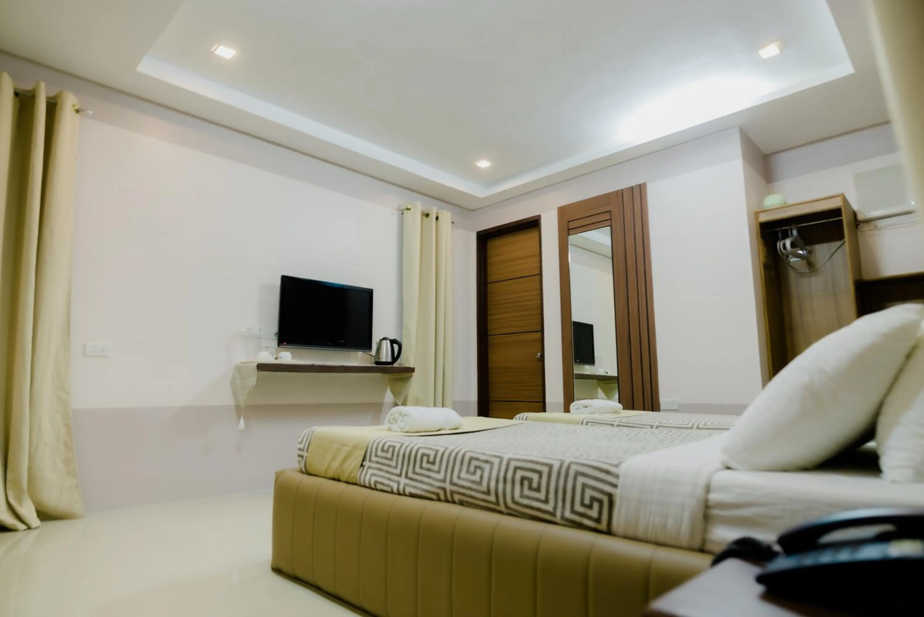 Photo of the whole room, Bed in The Horizon Suites and Arcade