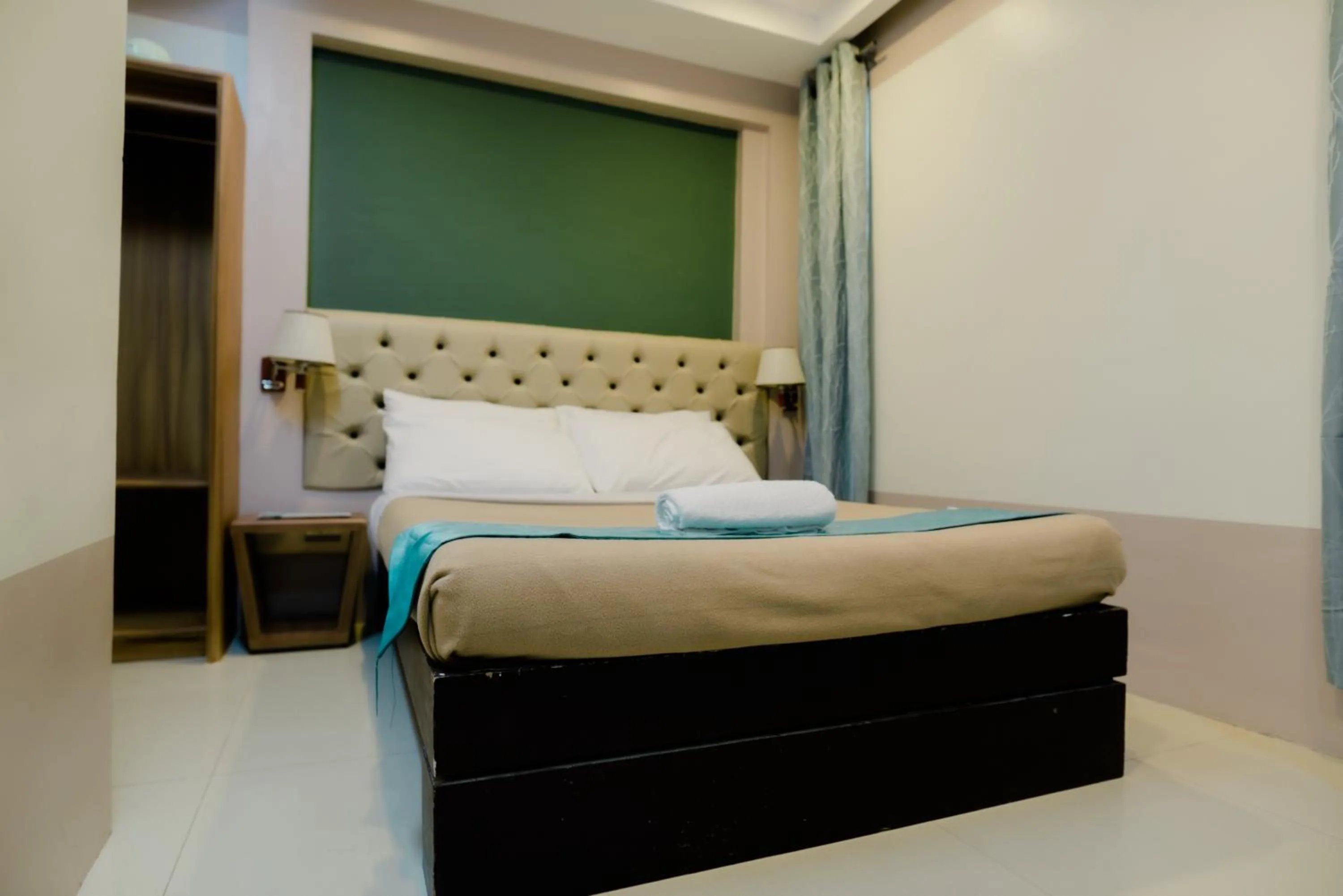 Bed in The Horizon Suites and Arcade