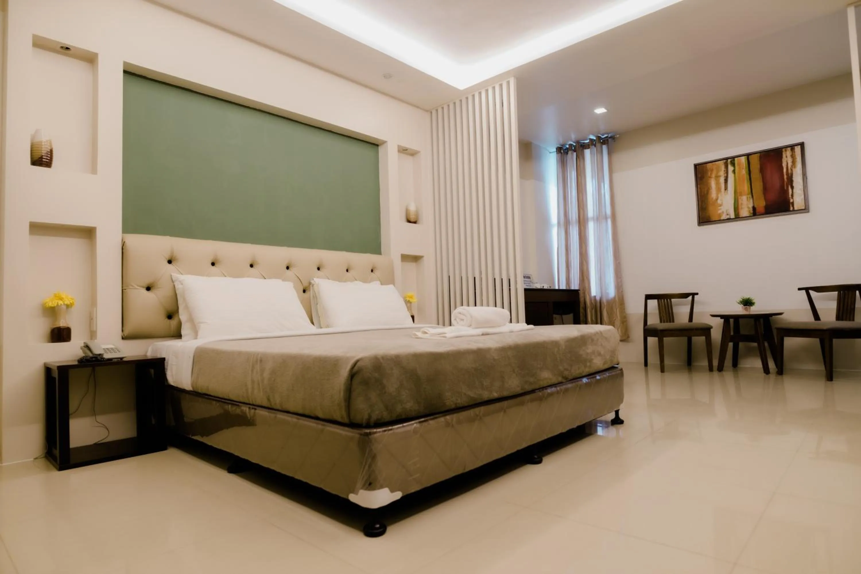 Bed in The Horizon Suites and Arcade