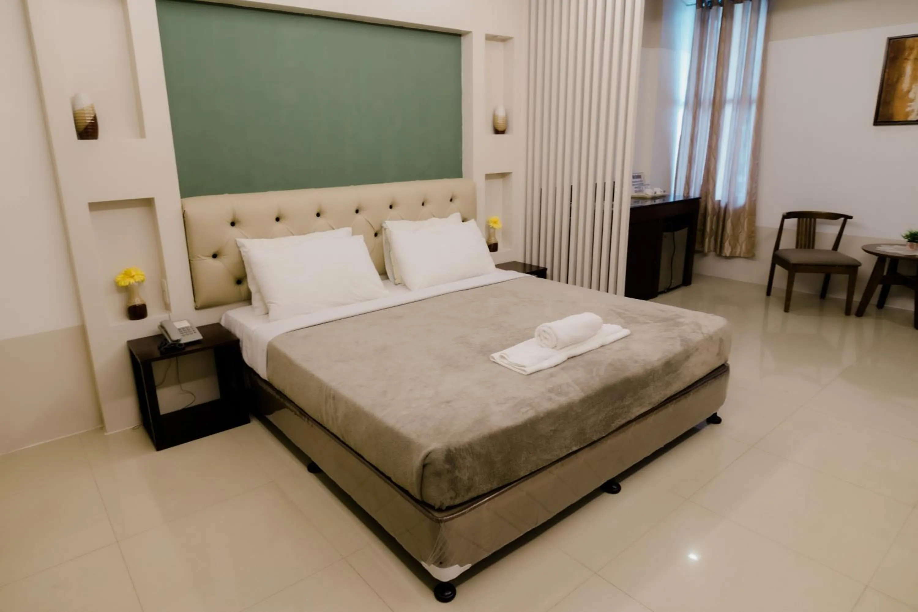 Photo of the whole room, Bed in The Horizon Suites and Arcade