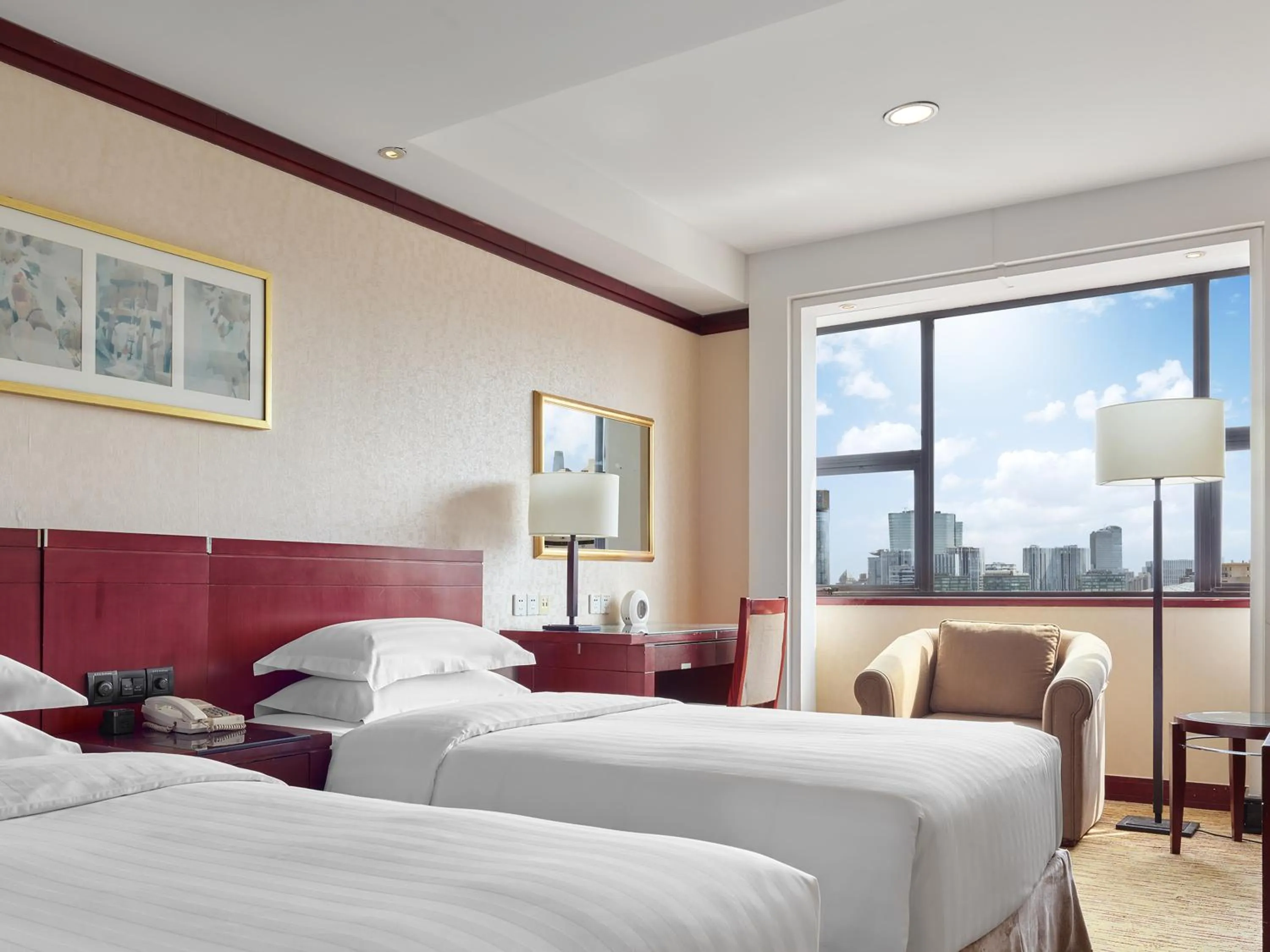 Bed in Beijing Poly Plaza Hotel