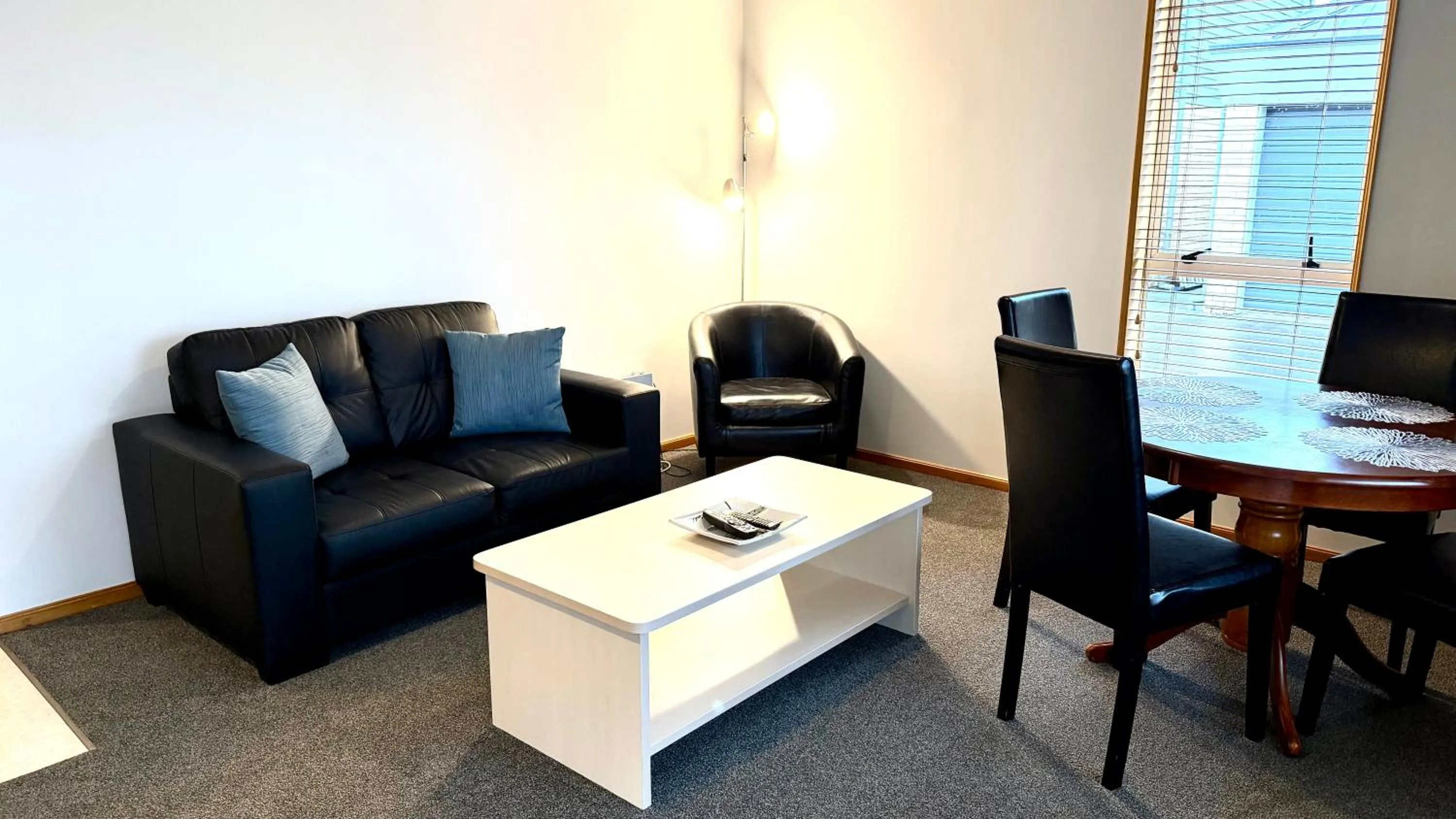 Living room in ASURE Chelsea Gateway Motor Lodge