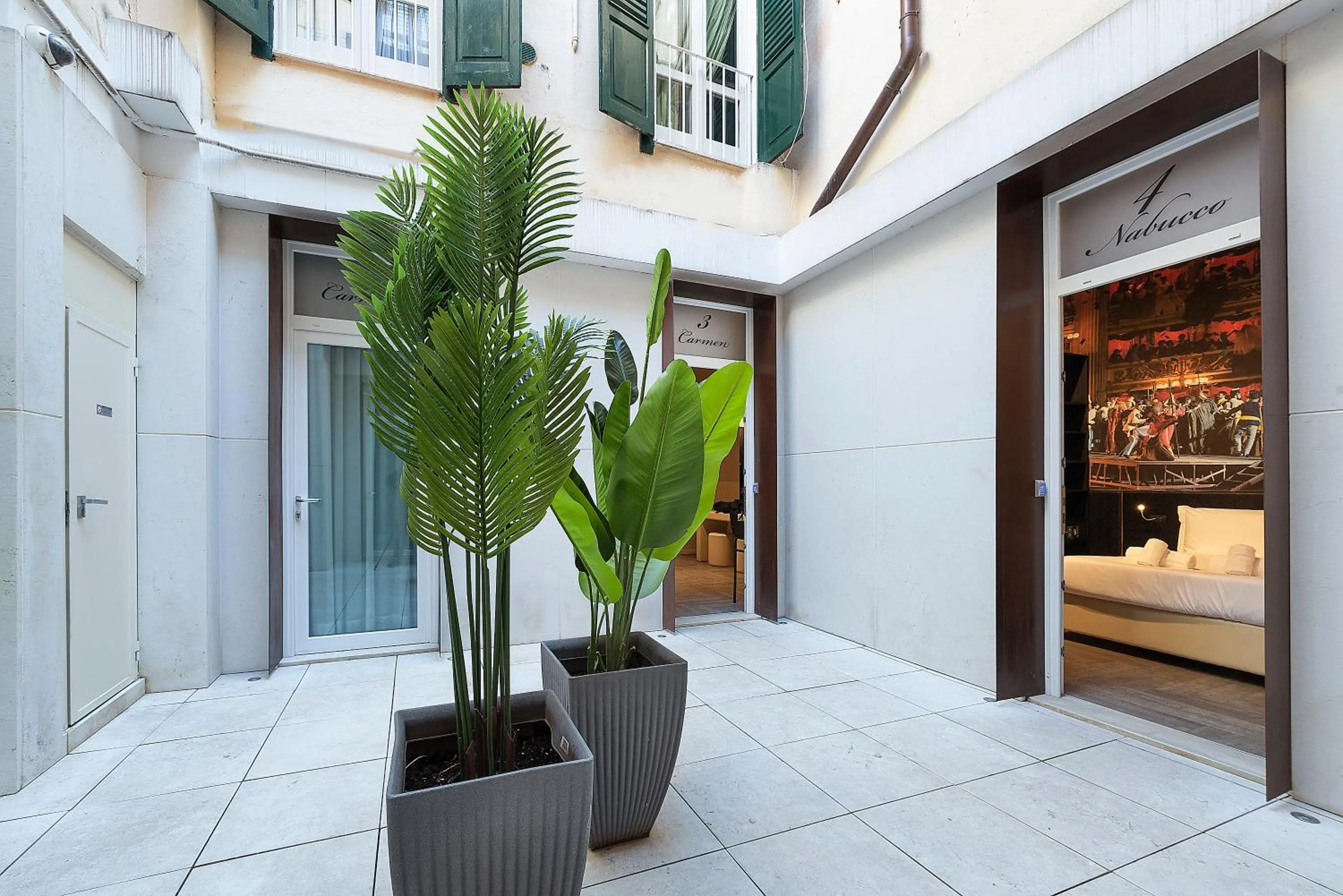 Patio, Bed in Italianflat - Theatrum Rooms and Suite