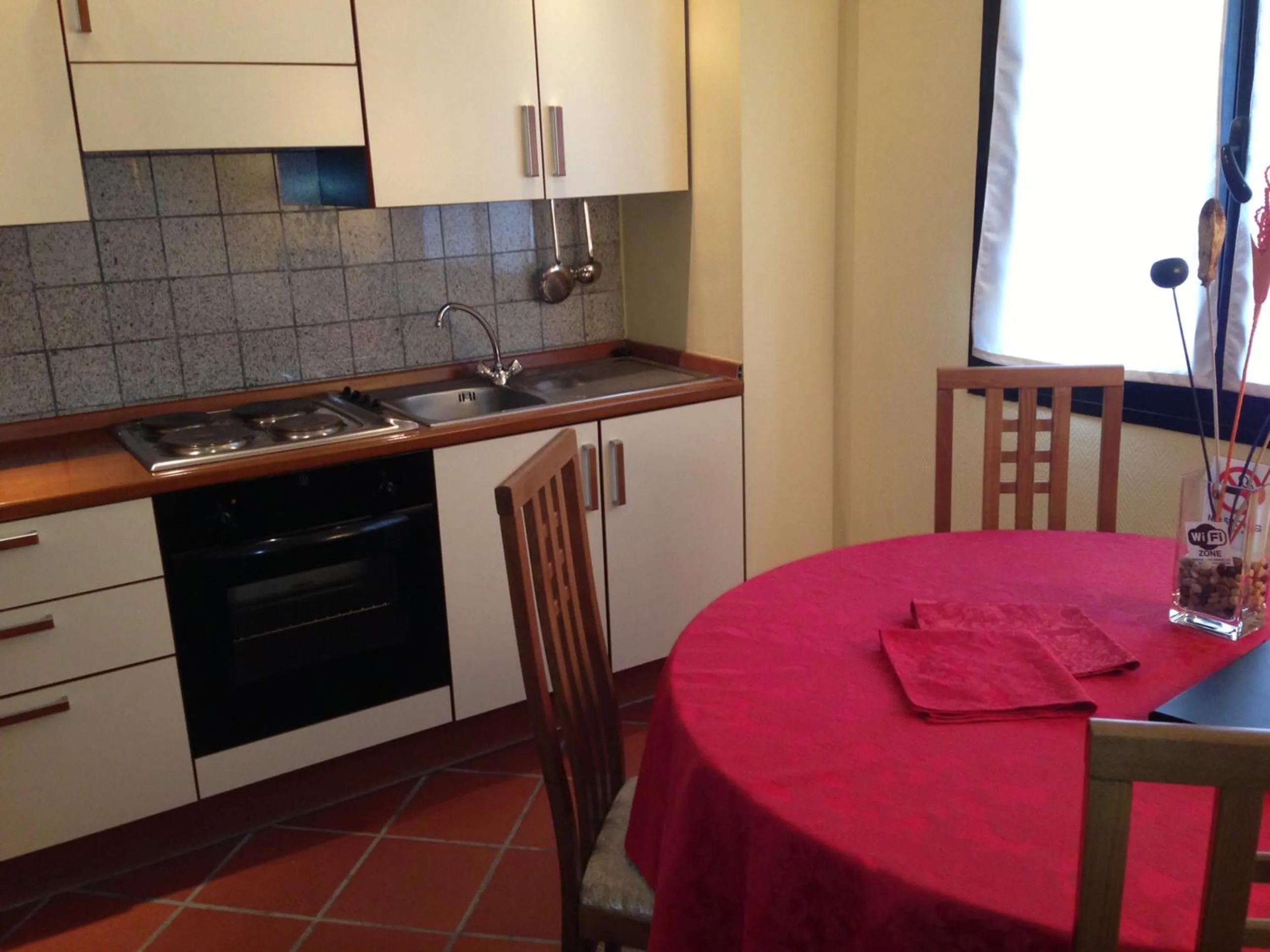 Kitchen or kitchenette in Aksai Residence