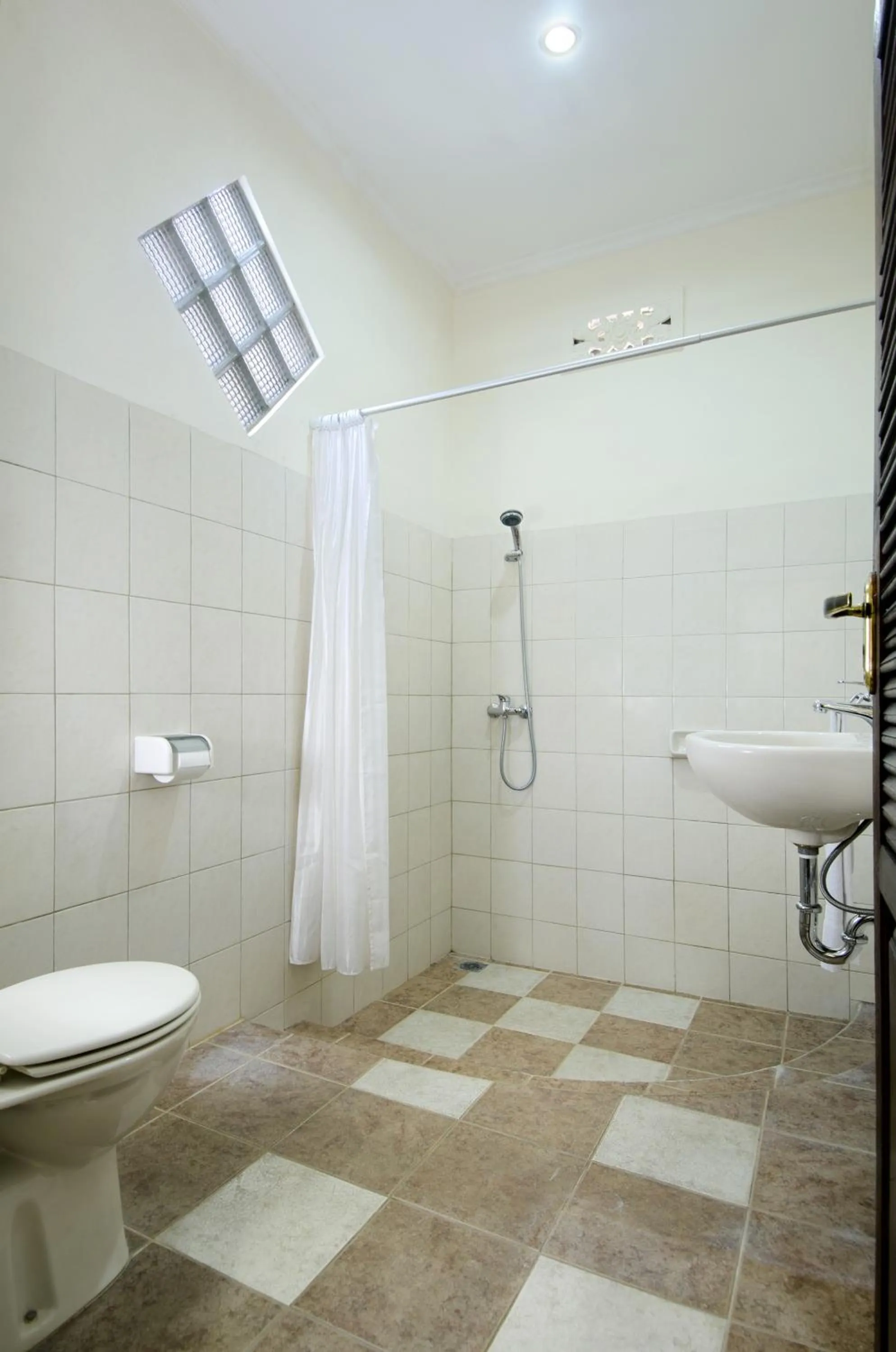 Bathroom in Teja Home Stay