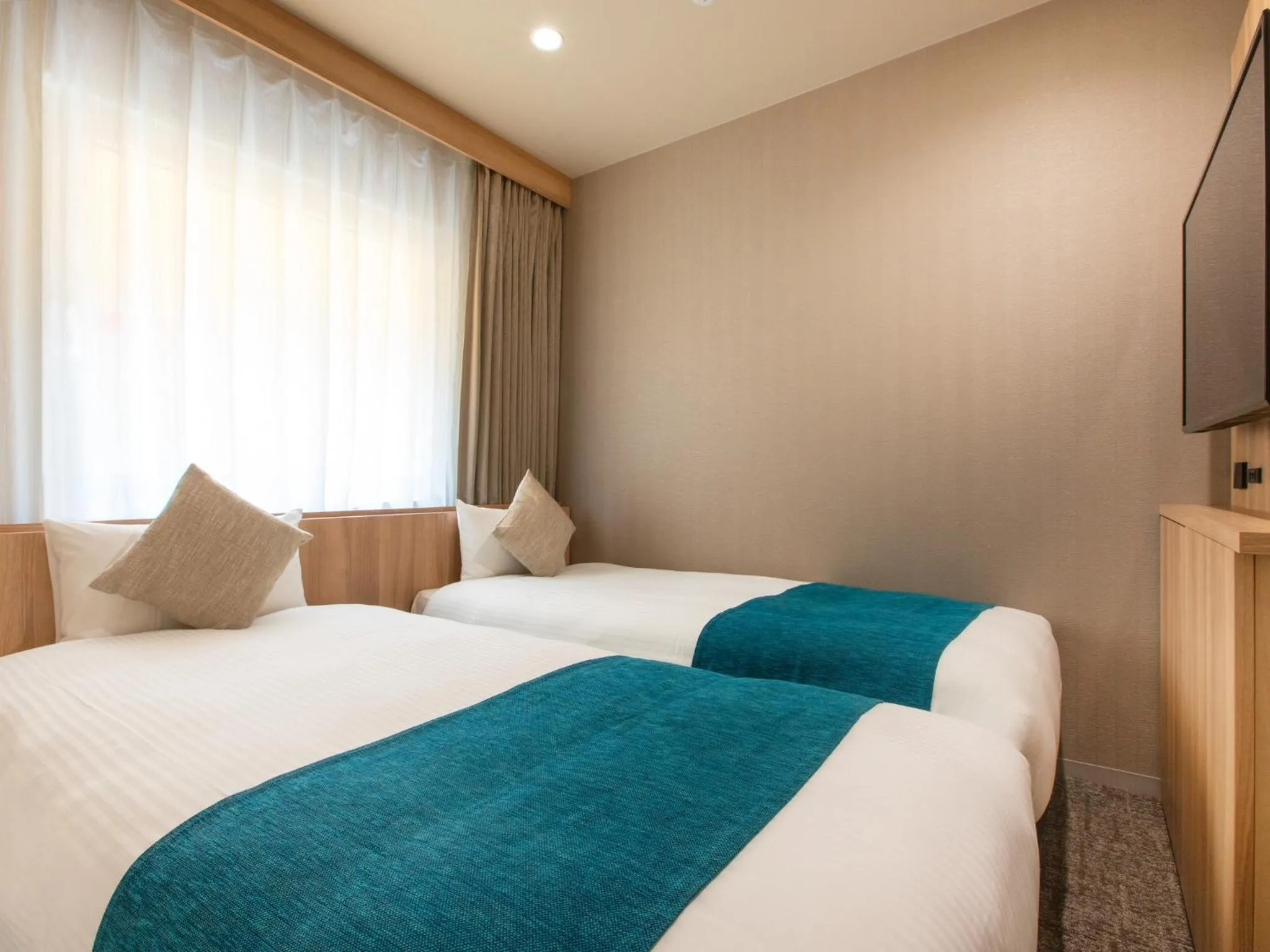 Bed in Hotel Villa Fontaine Tokyo-Jimbocho