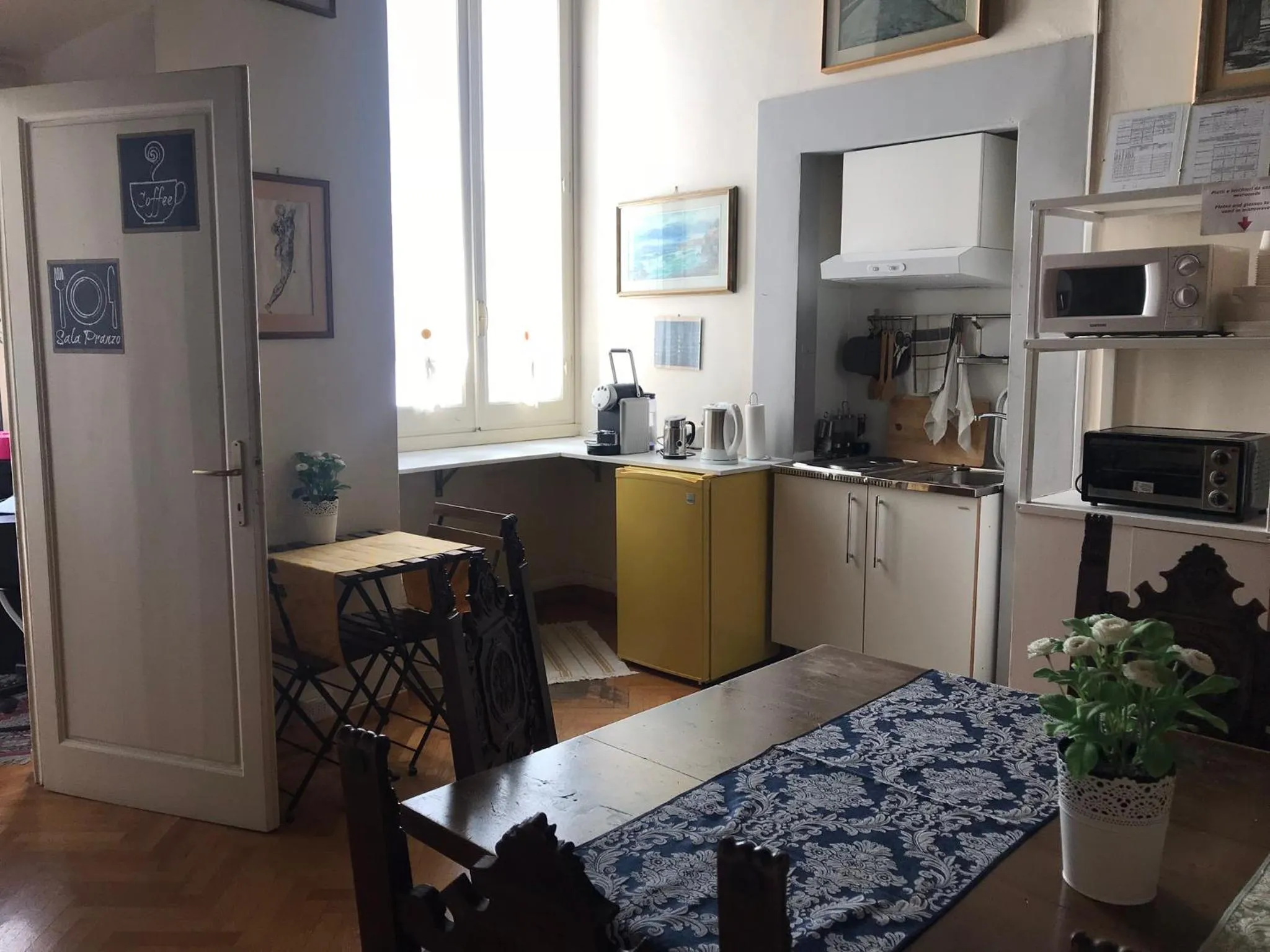 Communal lounge/ TV room in Soggiorno Antica Torre