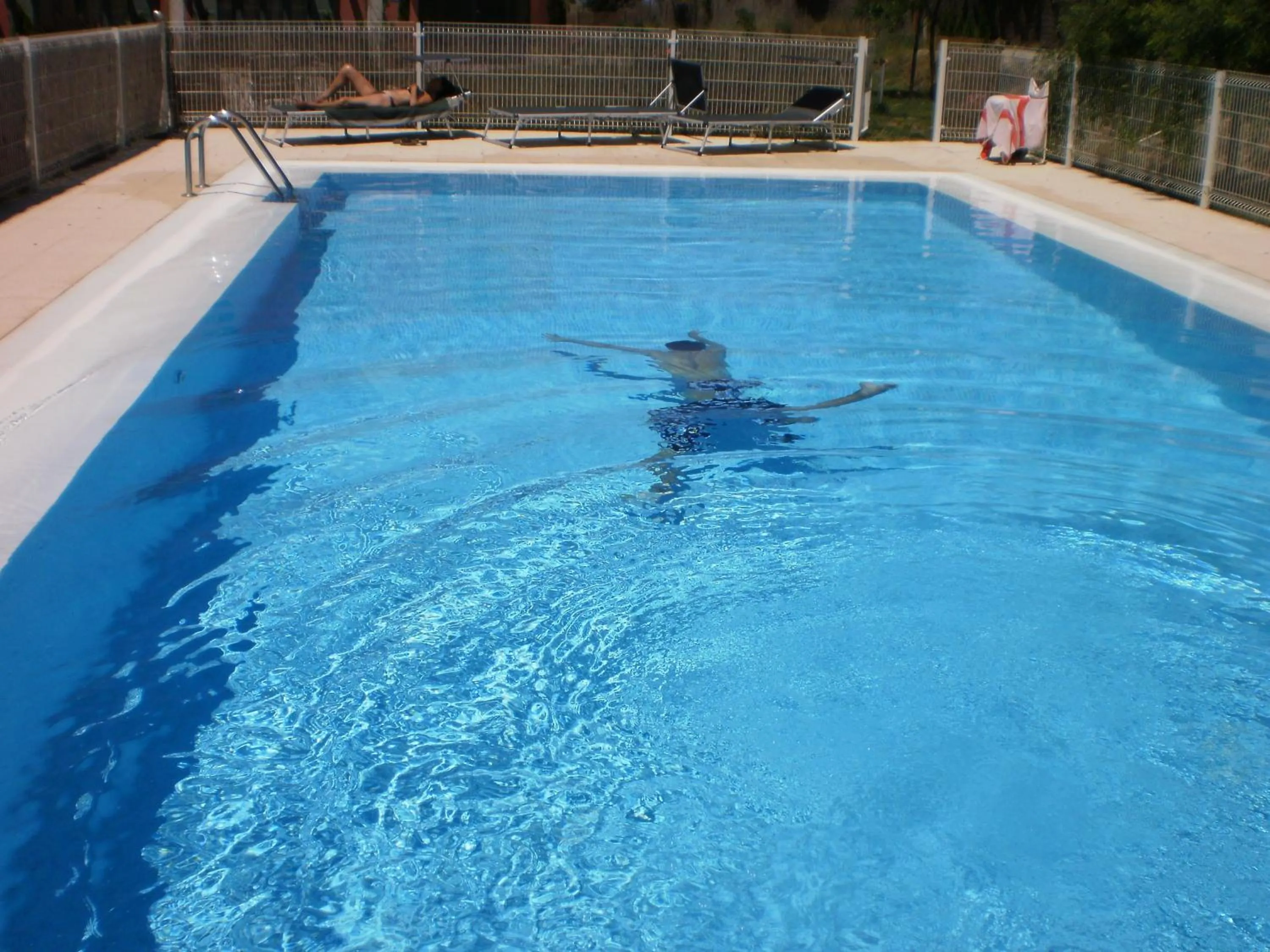 Swimming pool in Hotel Santa Coloma del Camino