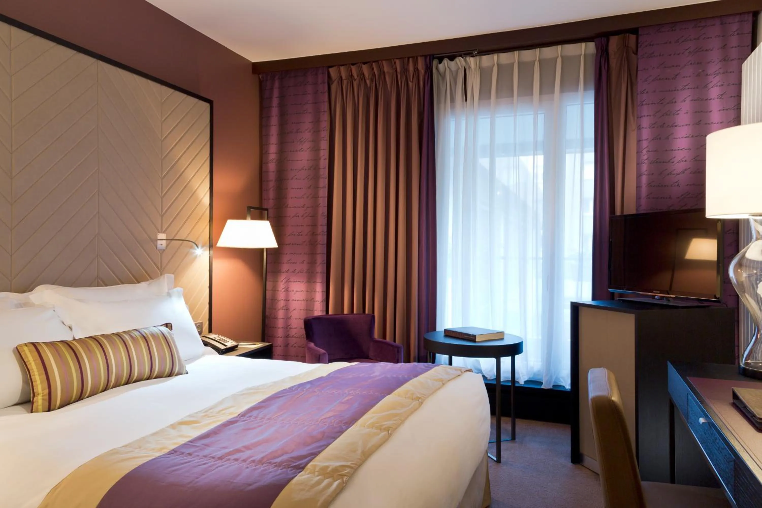 Bed in Sofitel Strasbourg Grande Ile