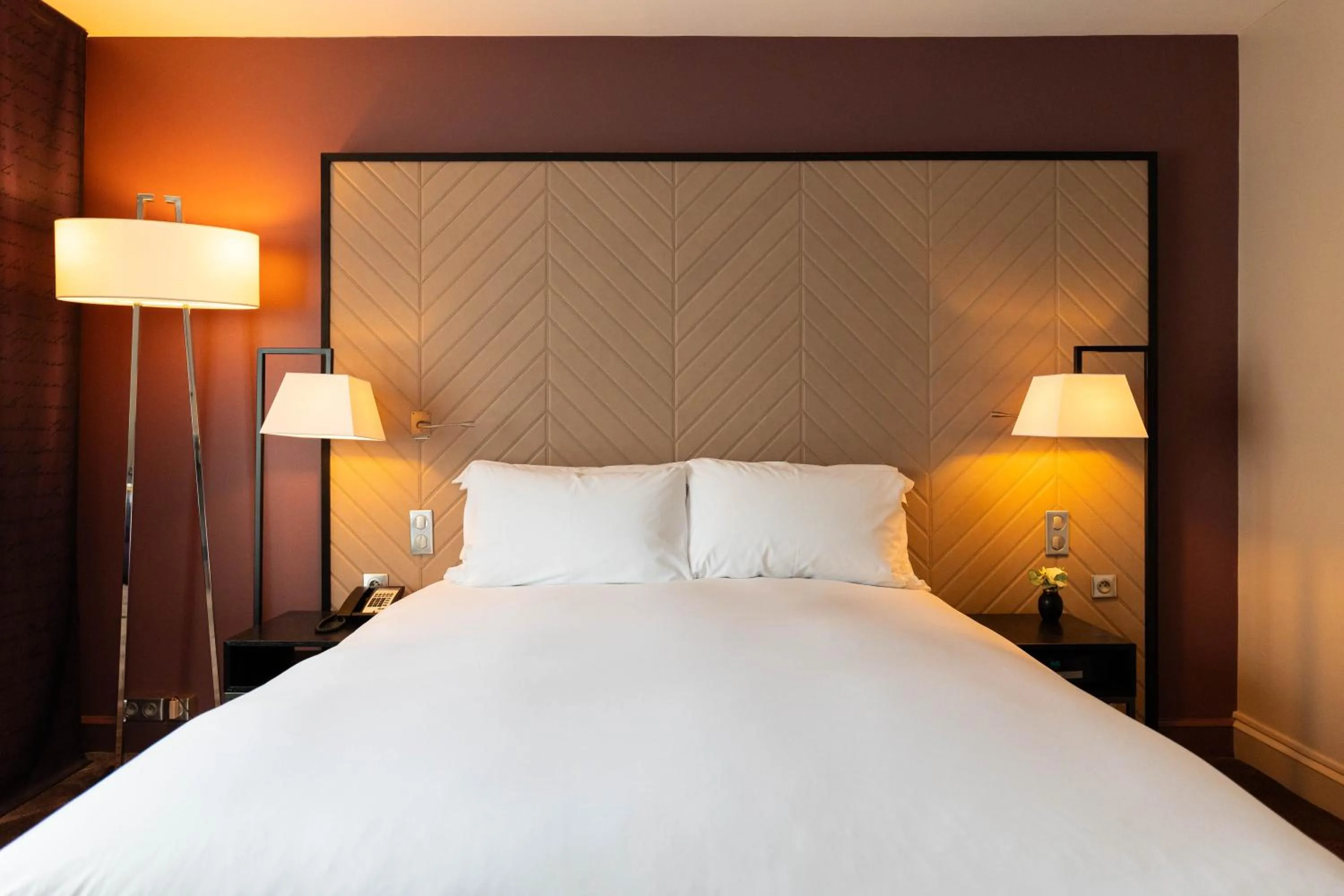 Bed in Sofitel Strasbourg Grande Ile