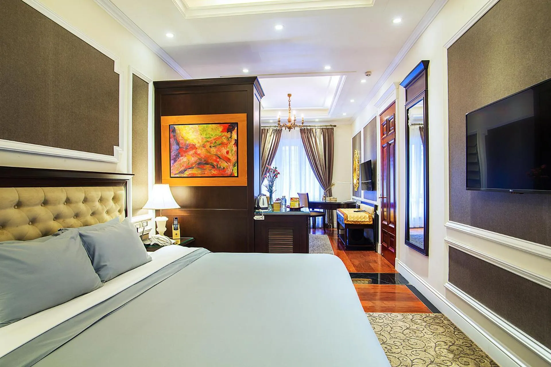 Bed in New Era Hotel & Villa