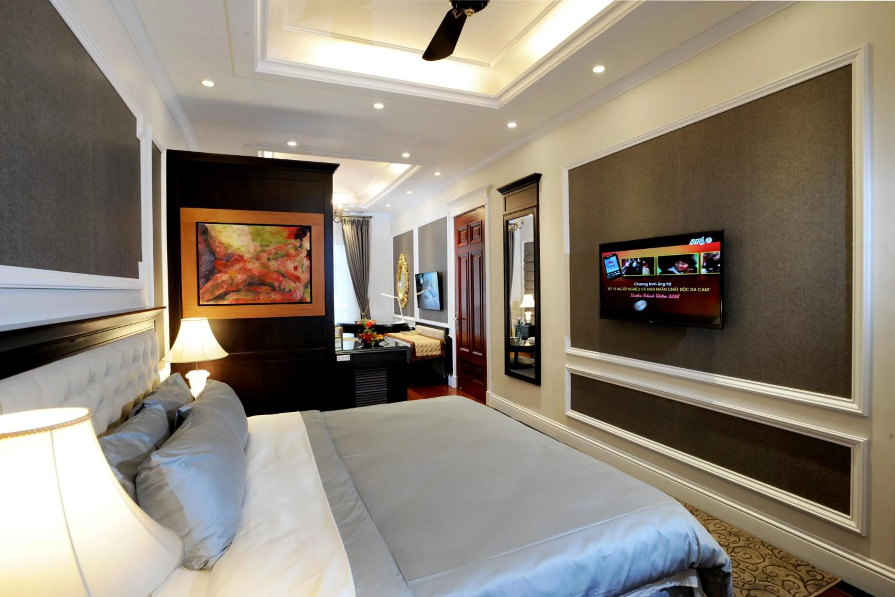 Bed in New Era Hotel & Villa
