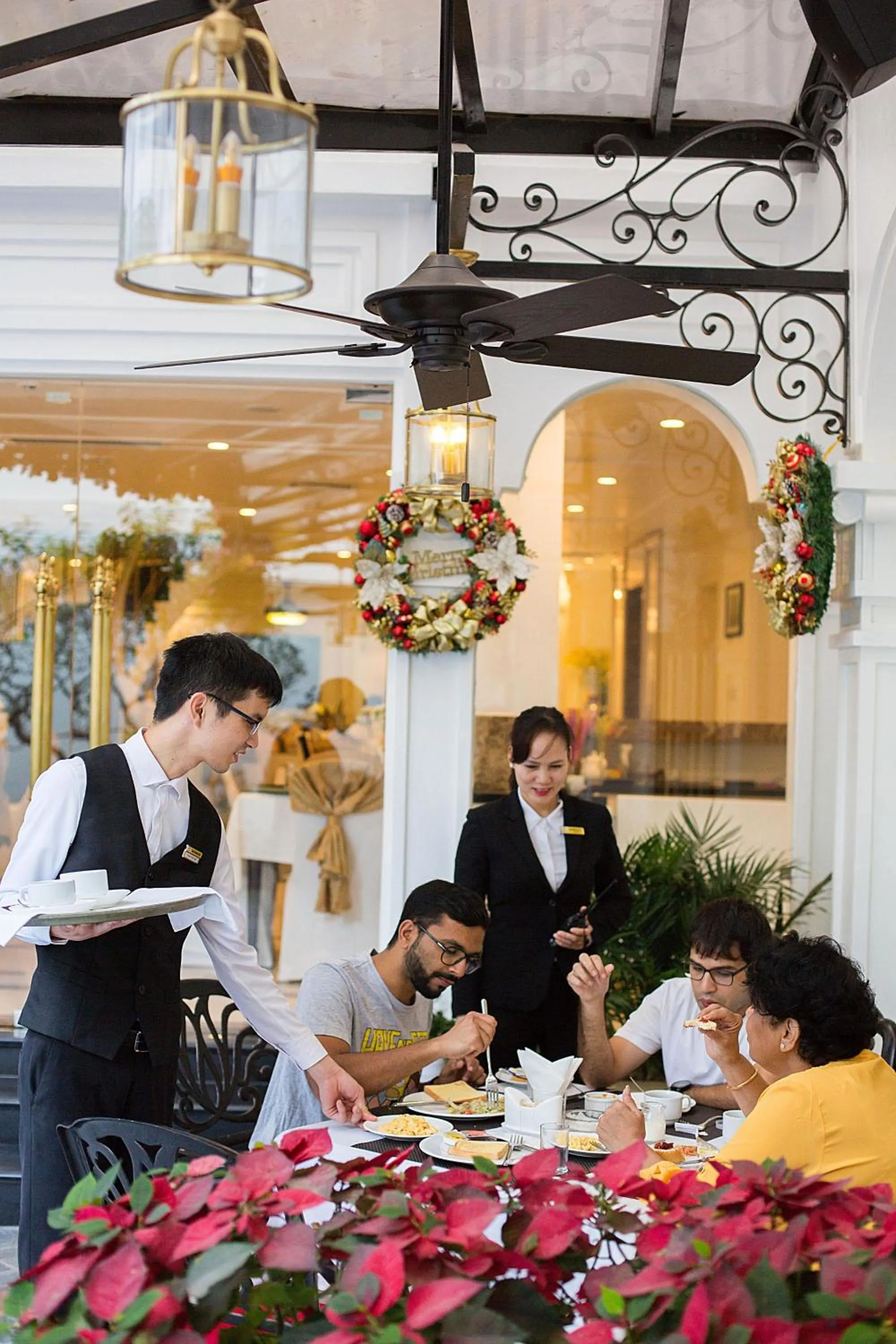 Staff in New Era Hotel & Villa