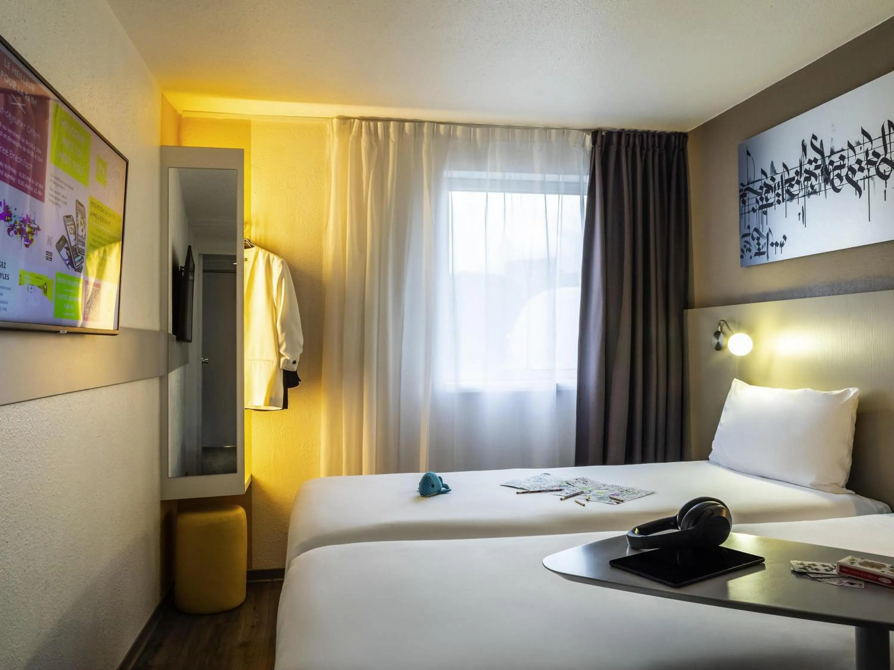 Bedroom, Bed in ibis Styles Paris Bercy
