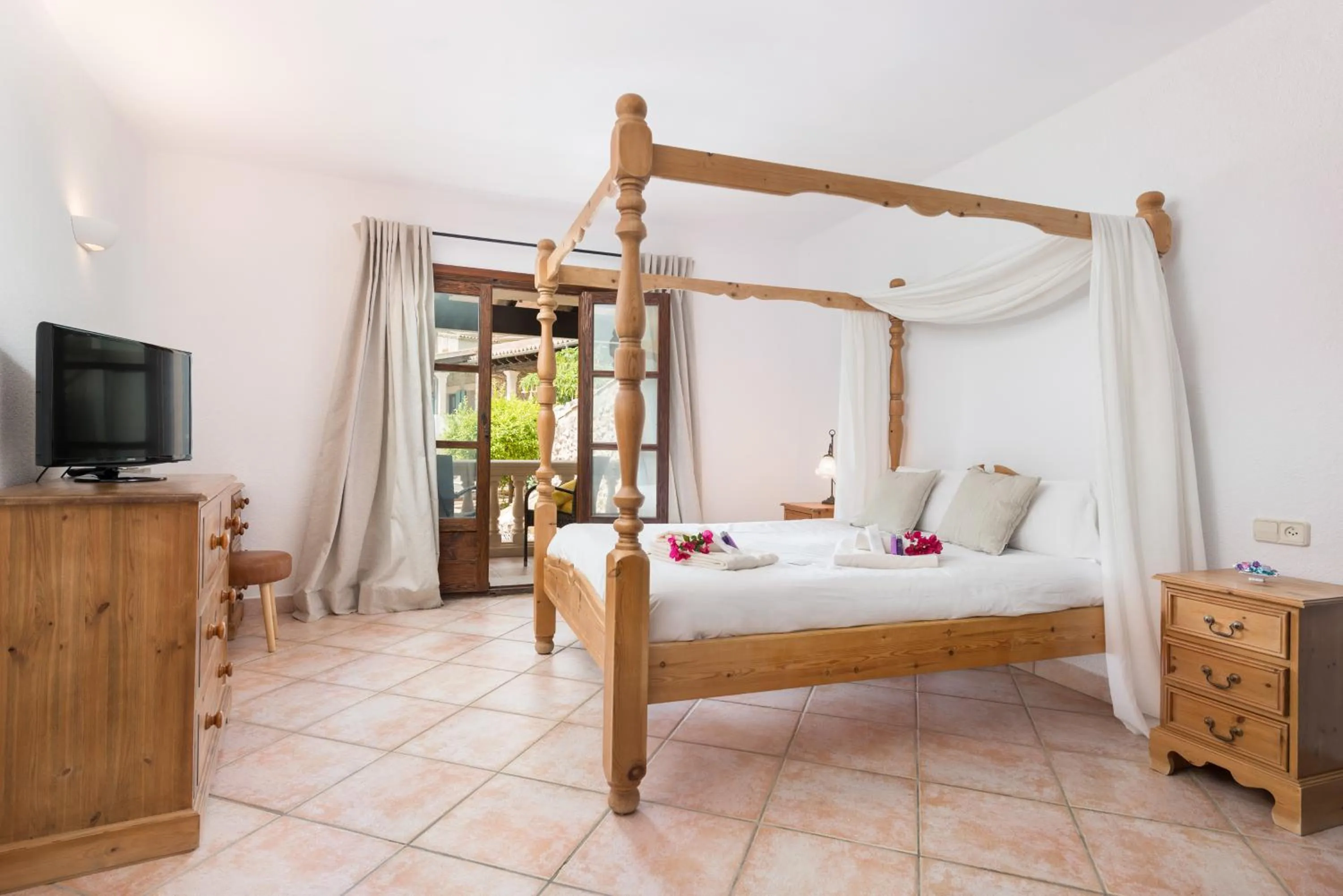 Photo of the whole room, Bed in New Can Furios Hotel by Can Calco Hotels