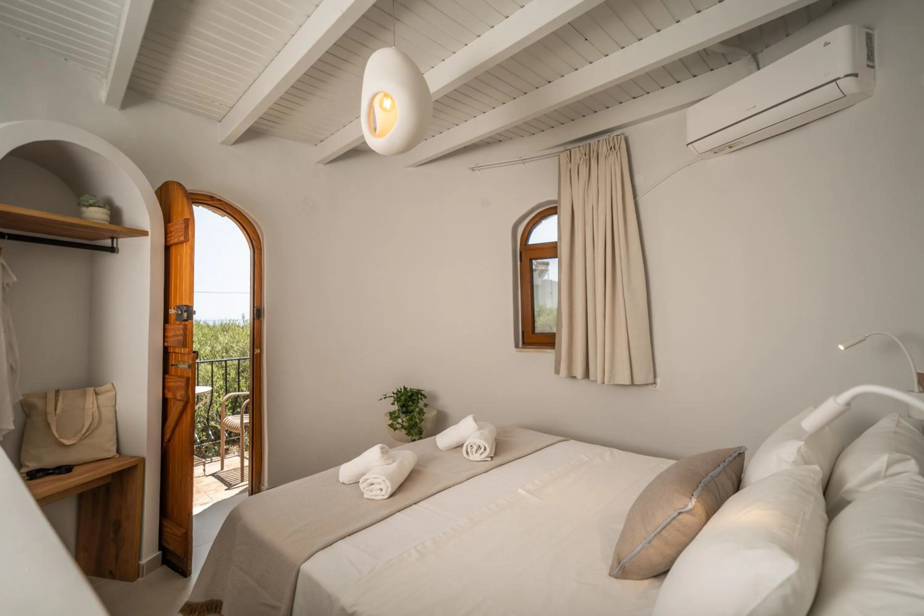 Bed in Fata Morgana Studios & Apartments