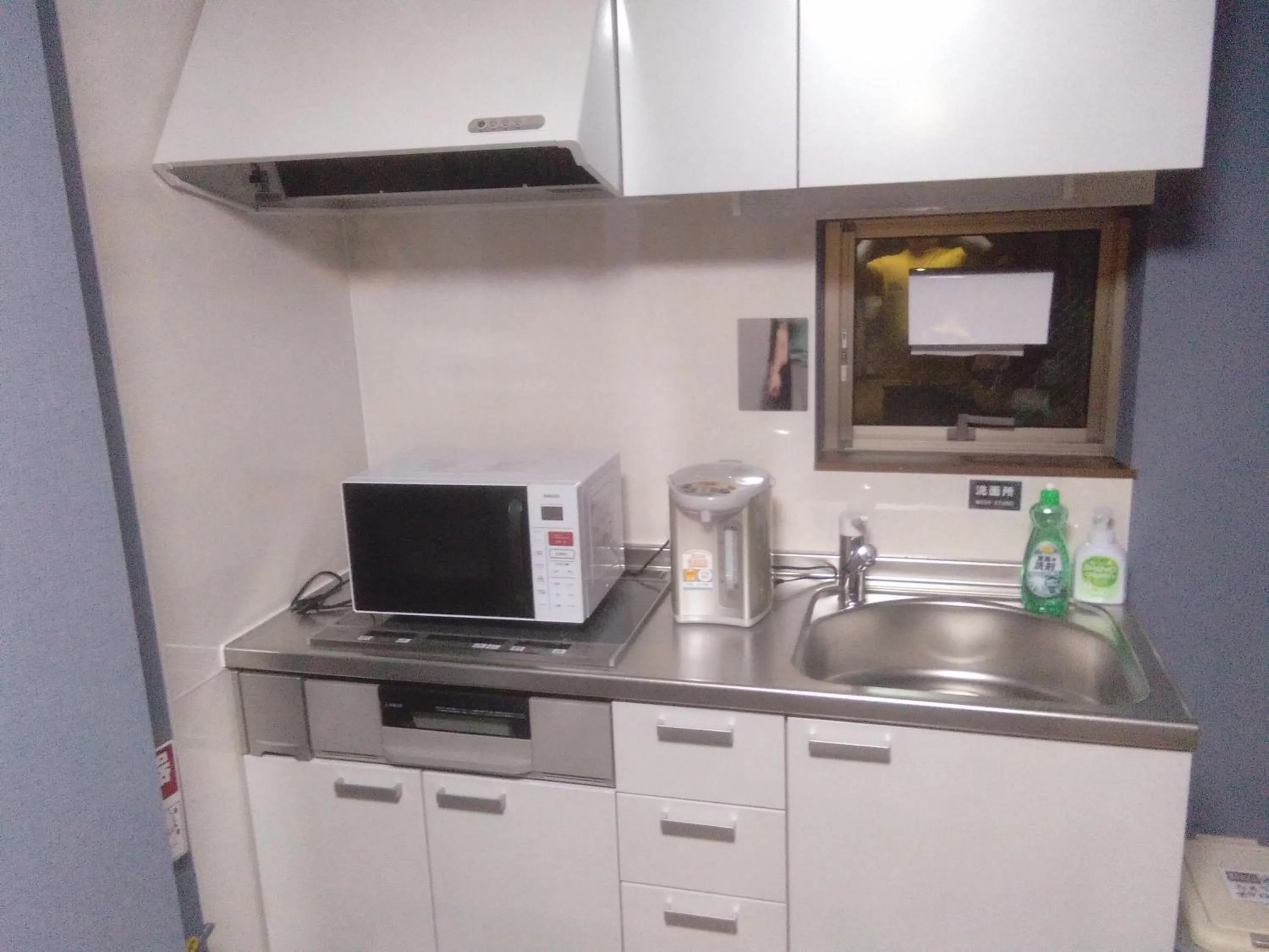 Communal kitchen in Nice Hostel Yahiro