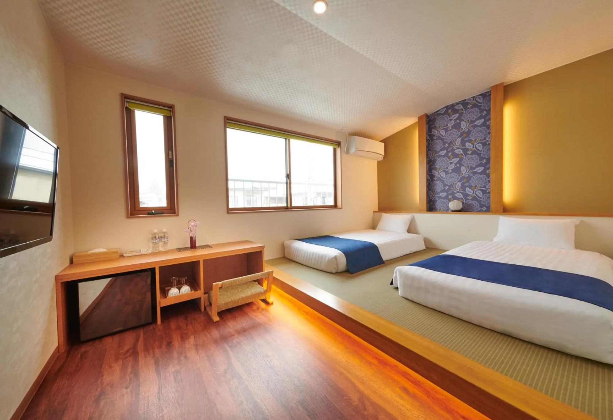 Bed in Ichinomatsu Japanese Modern Hotel