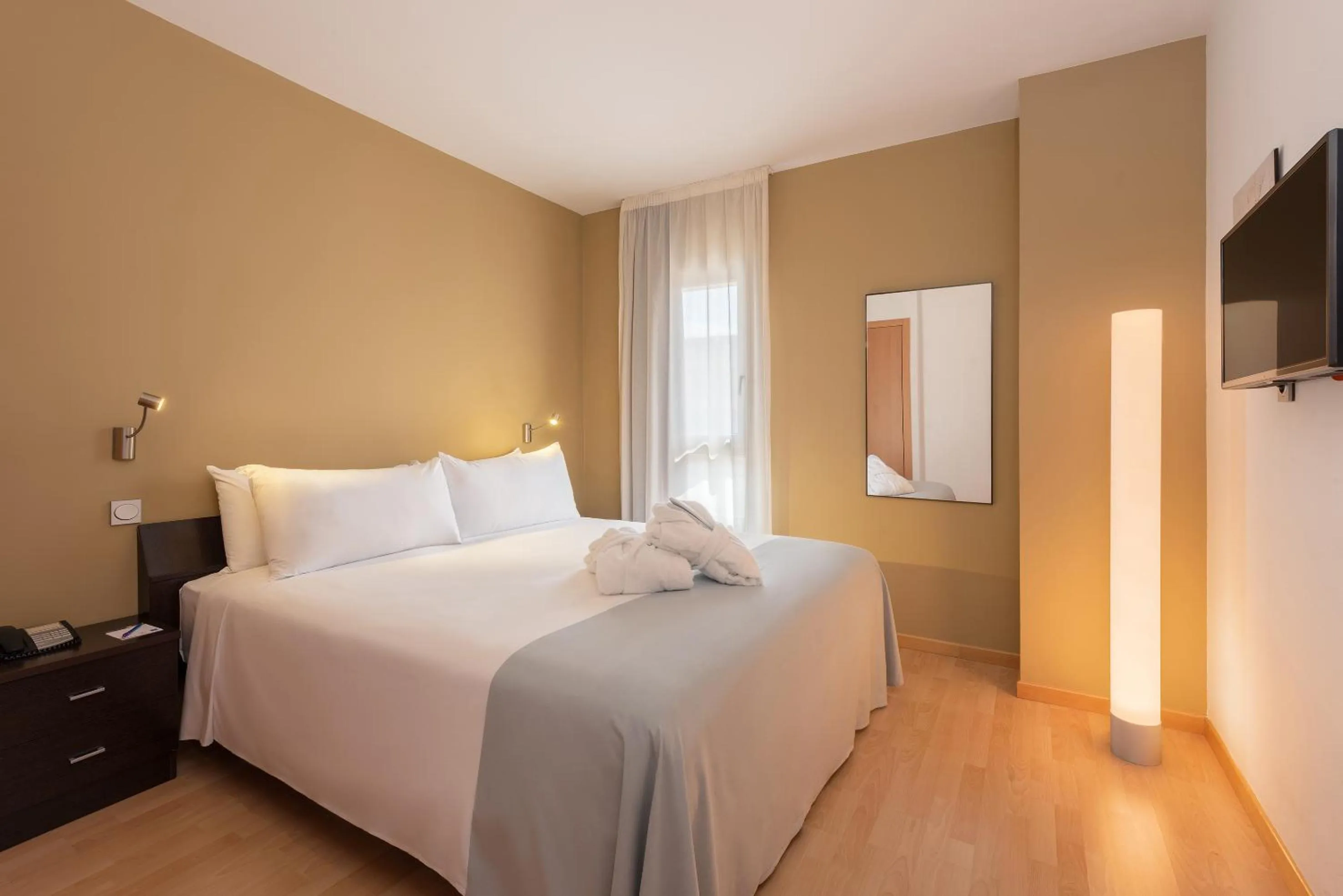Bed in Madrid Airport Suites, Affiliated by Meliá