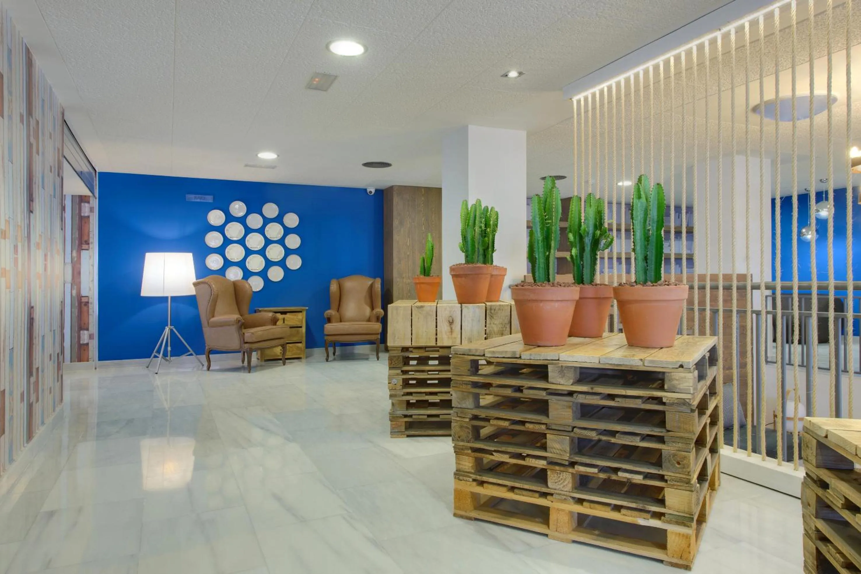 Lobby or reception in Madrid Airport Suites, Affiliated by Meliá