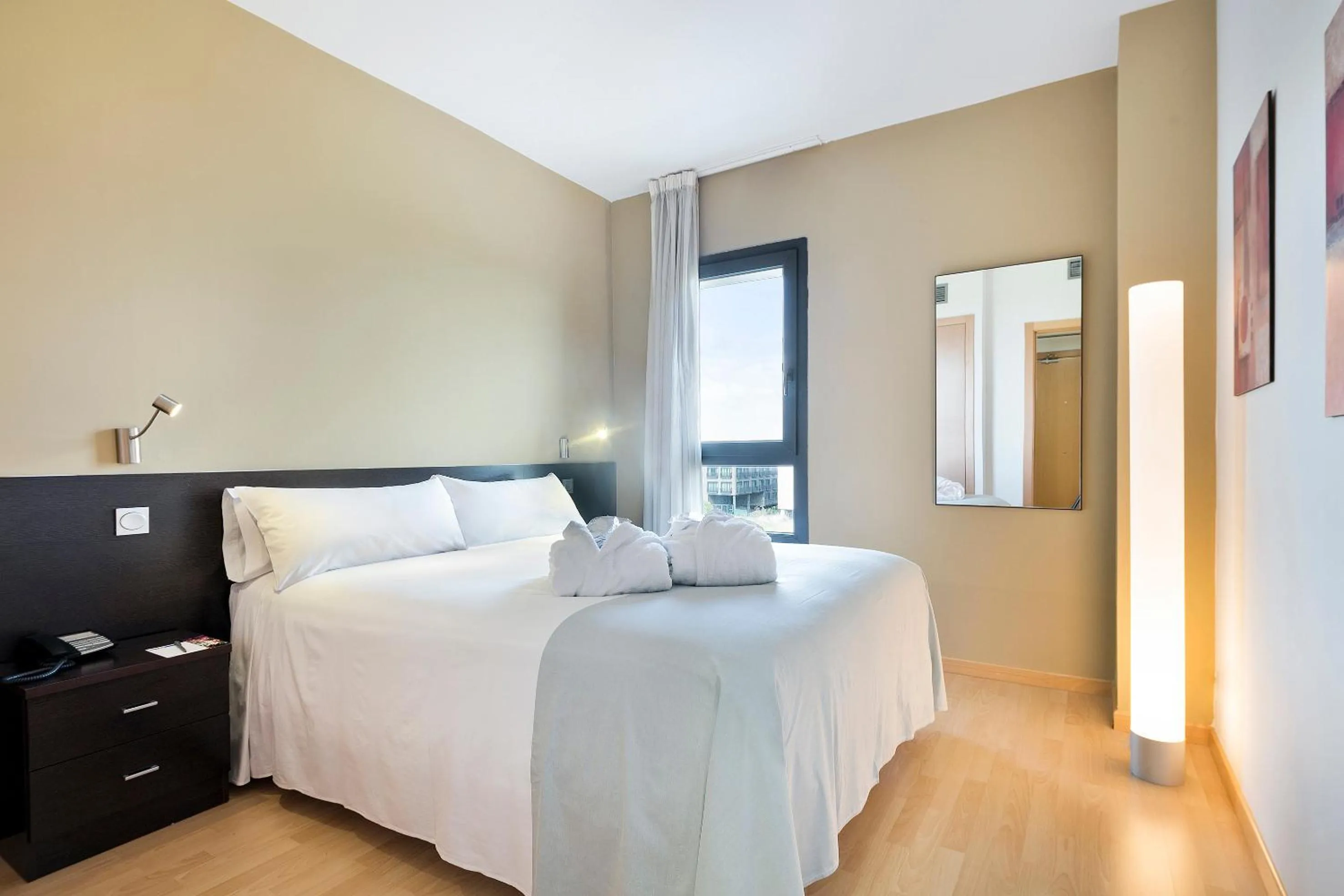 Photo of the whole room, Bed in Madrid Airport Suites, Affiliated by Meliá