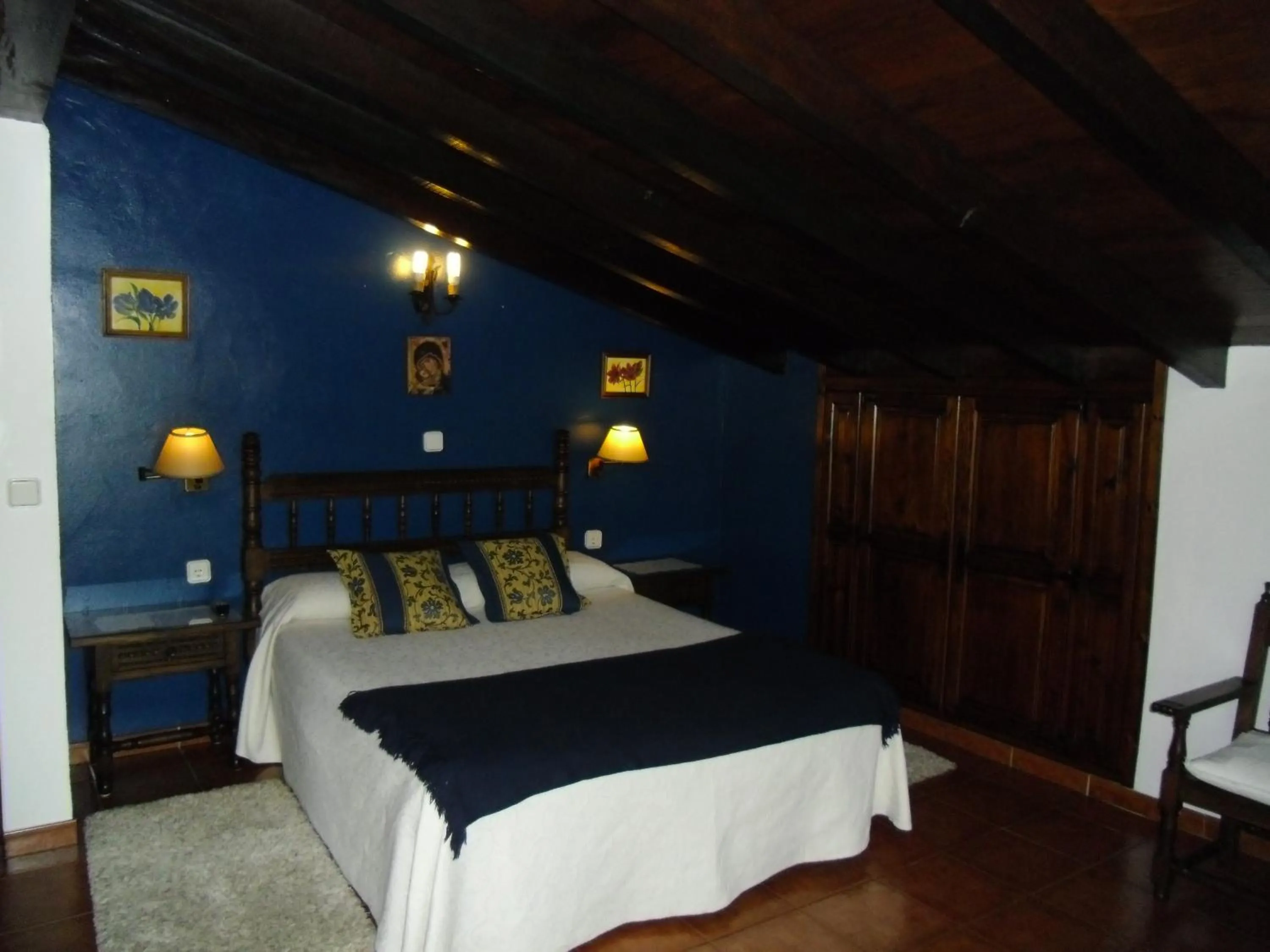 Photo of the whole room, Bed in Posada Herrán