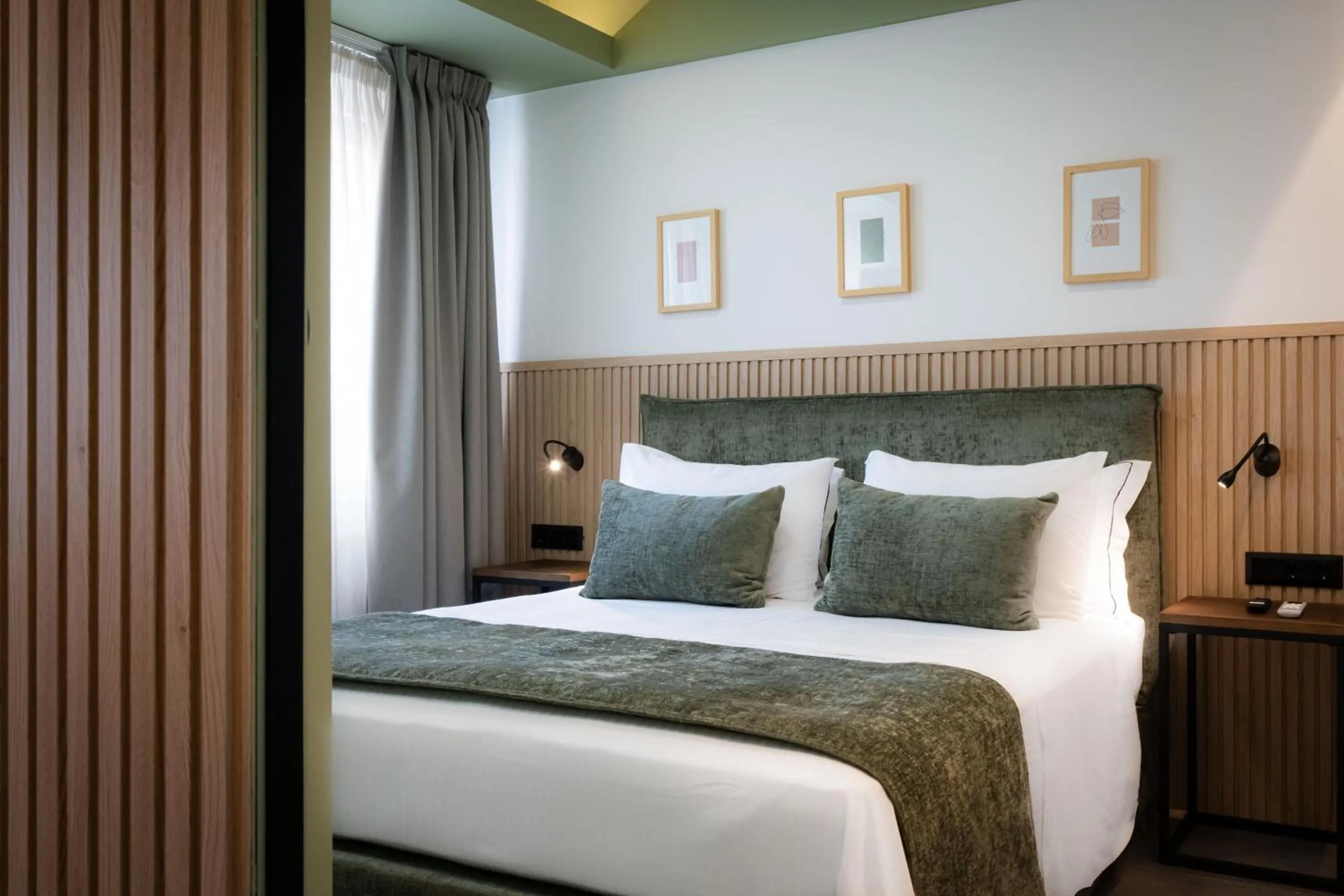 Bed in Evripidou Suites