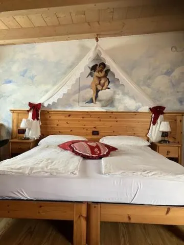 Bed in Hotel Garnì Salvanel