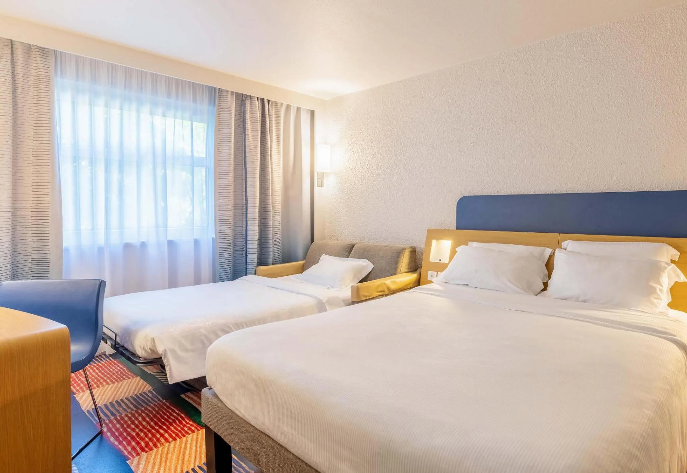 Photo of the whole room, Bed in B&B HOTEL Lyon Nord 4 étoiles