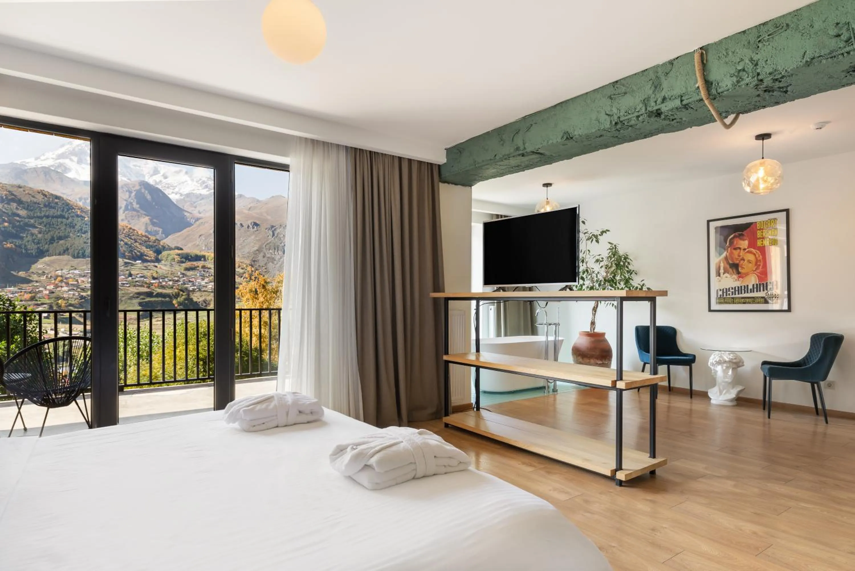 Photo of the whole room, Bed in Intourist Kazbegi