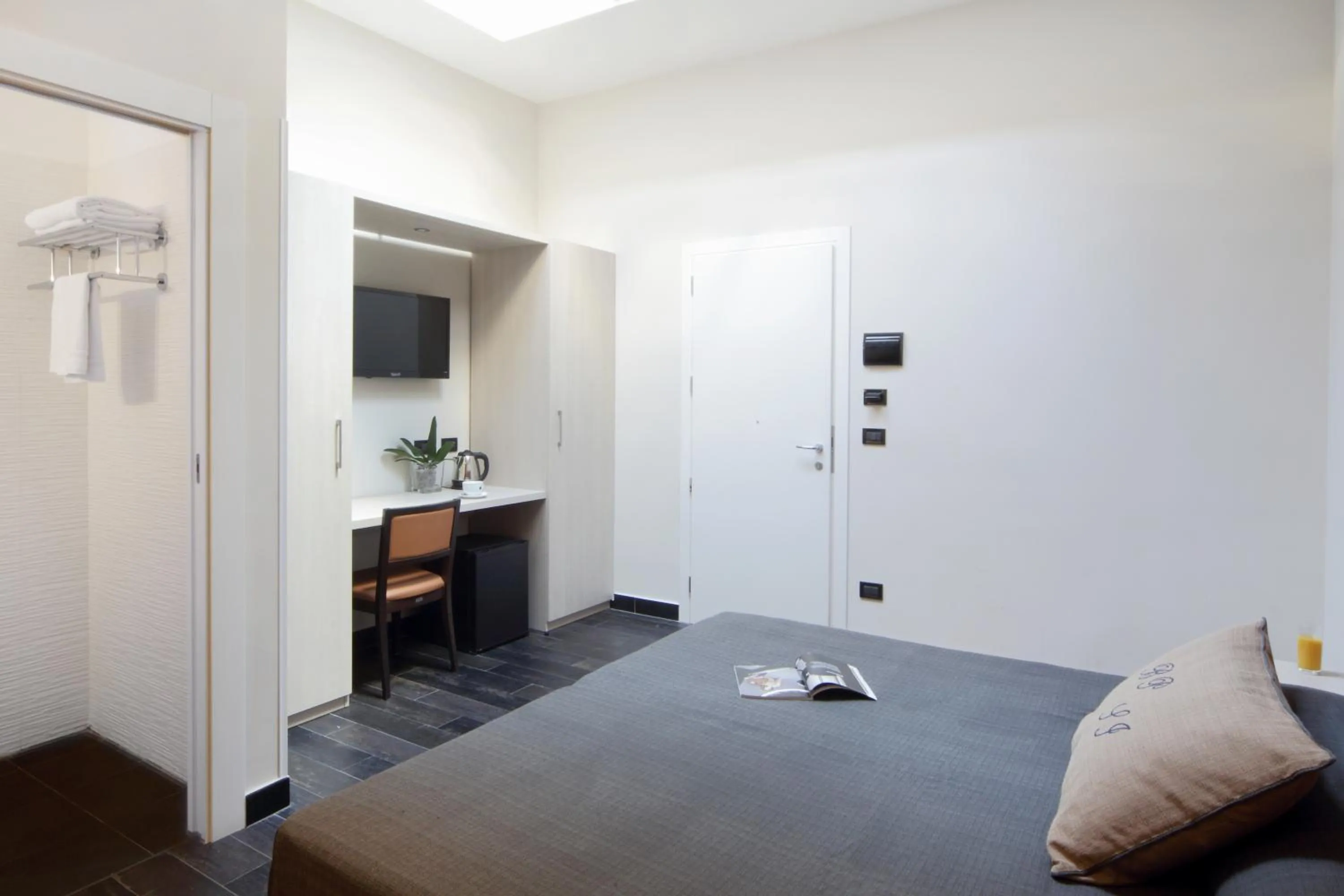 Decorative detail, Bed in Borgo Pio Suites Inn