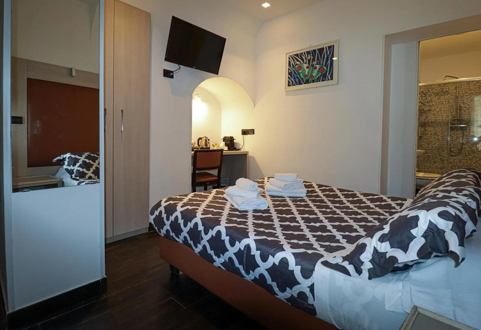 Decorative detail, Bed in Borgo Pio Suites Inn