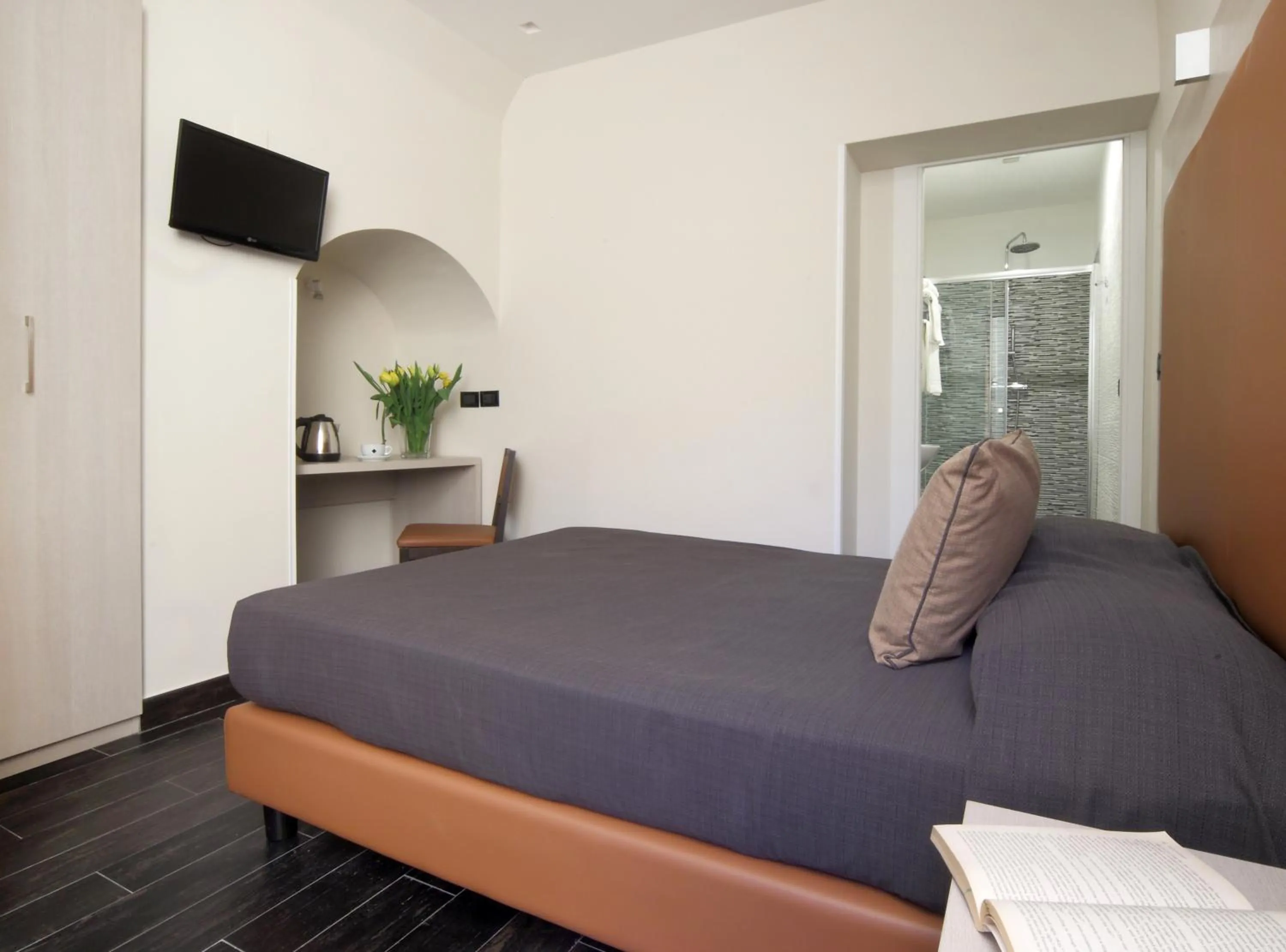 Decorative detail, Bed in Borgo Pio Suites Inn