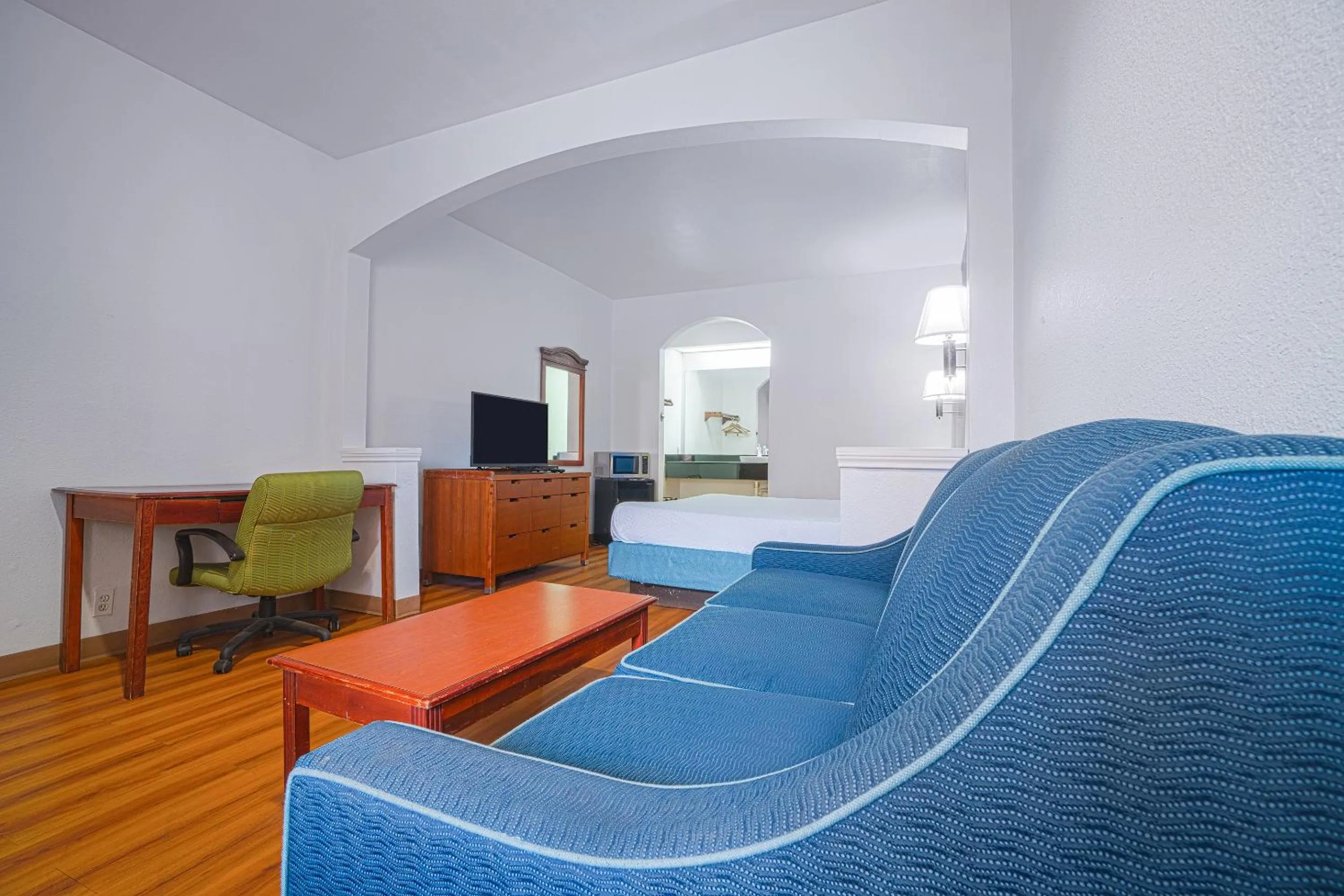 Seating area in Island Inn By OYO Galveston Beach, TX