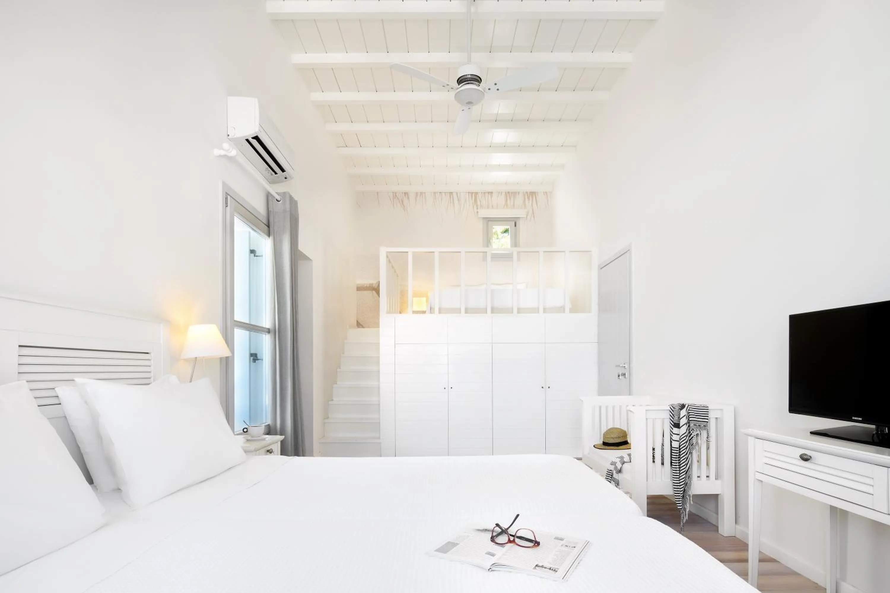 Bed in Skyros Ammos Hotel