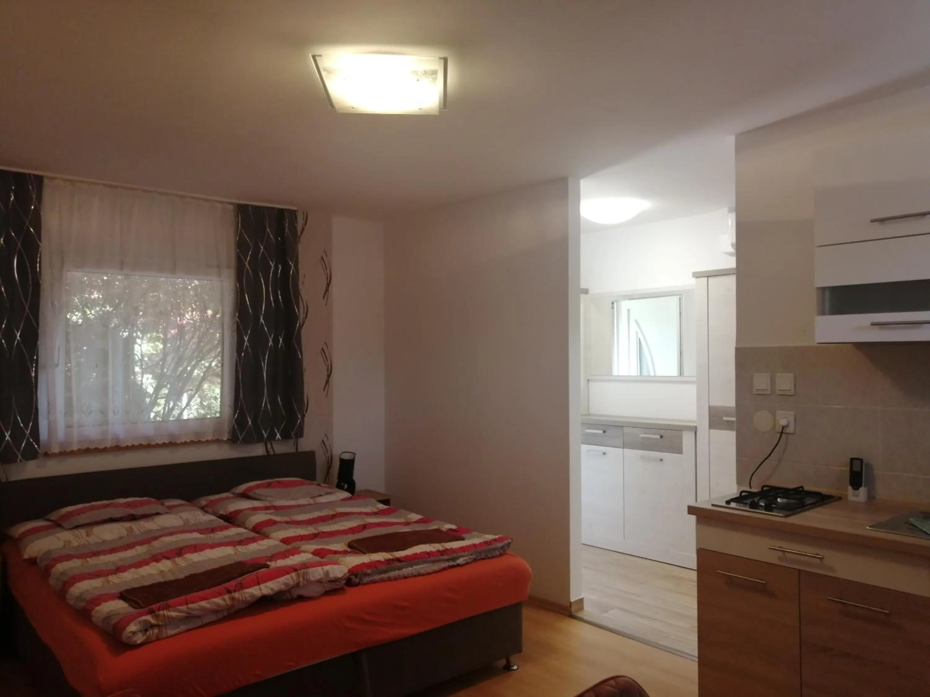 Bed in Tünde Apartman