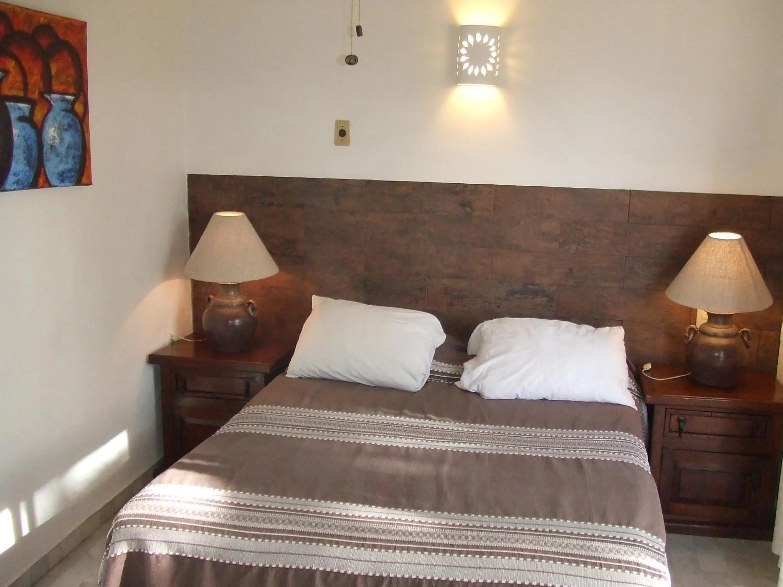 Bed in Aventura Pacifico Boutique Suites & Villas